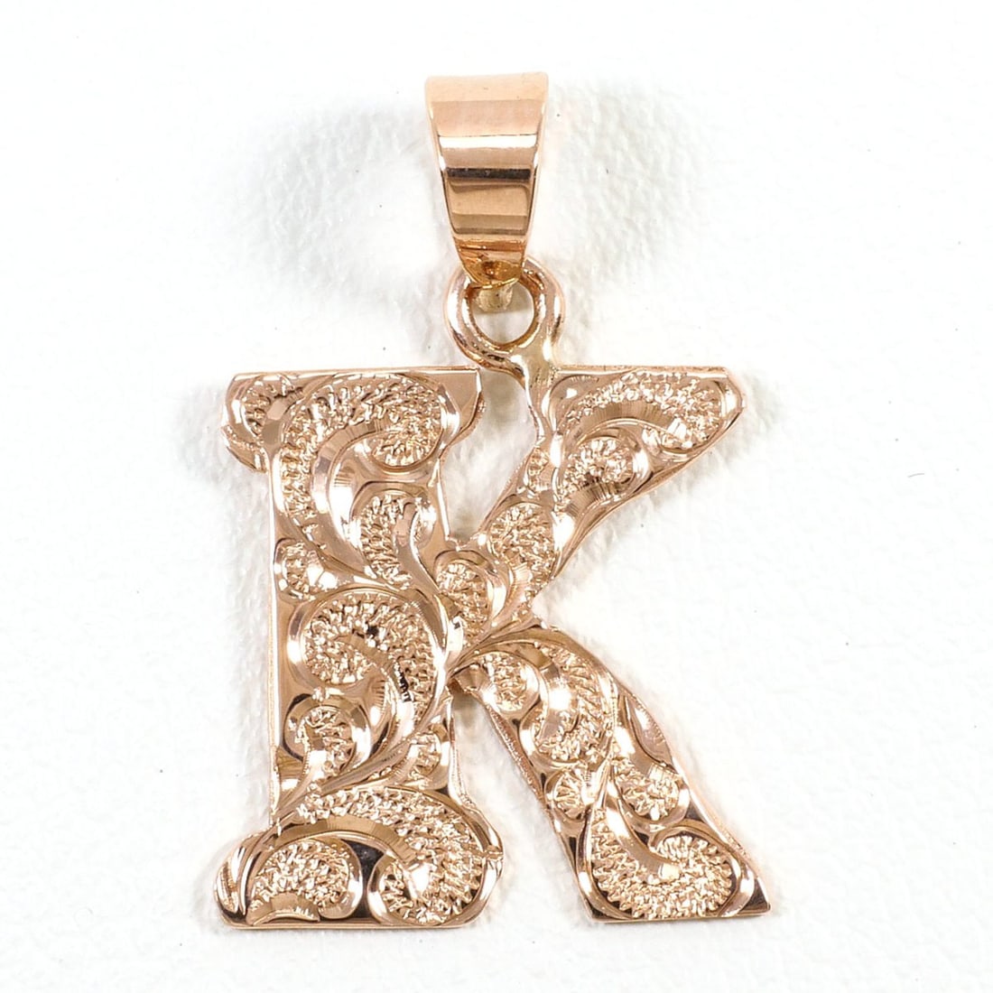K14 14K Pink Gold Pendant Top, Total Weight 1.7g, Like New Jewelry: --- Catalog ---Category: SizeWeight: 1.7g / 0.05oz.Pendant Size: 24mm x 15mm / 0.94'' x 0.59''Category: DesignColor: Pink goldMetal: GoldGender: Women,MenMaterial: Pink gold (14K)Metal Purity: 14KNeck