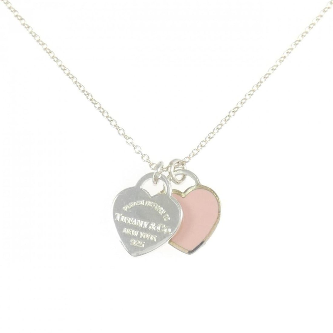 Tiffany & Co. Return to Mini Double Heart Tag Necklace: --- Catalog ---Category: SizeWidth: 1mm / 0.04''Weight: 2.5g / 0.08oz.Pendant Size: 11.2mm x 10mm / 0.44'' x 0.39''Neck Circumference: 41 cm / 16.14''Category: DesignGender: WomenMaterial: Silver