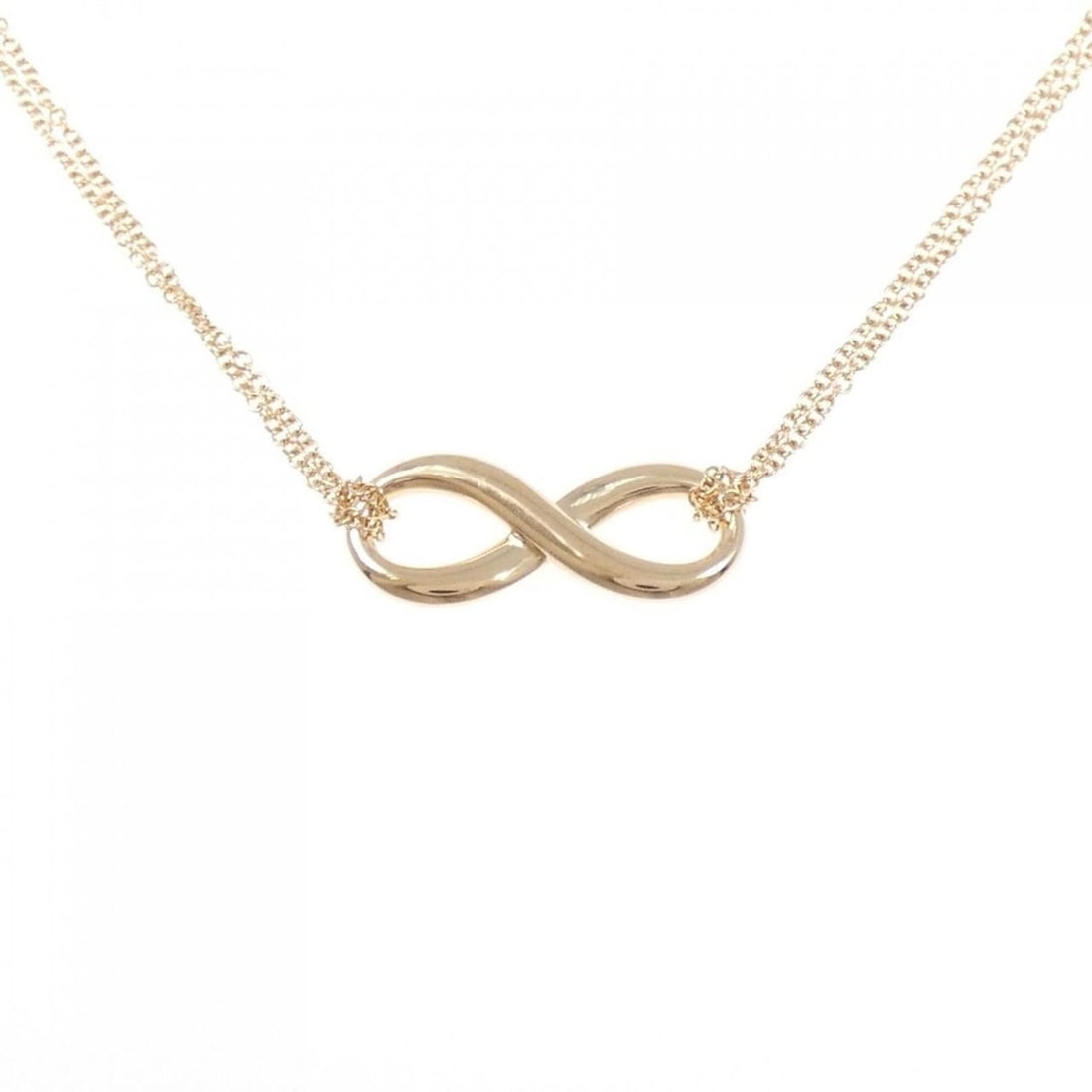 Tiffany Infinity Necklace: --- Catalog ---Category: SizePendant Size: 8.2mm x 20mm / 0.32'' x 0.78''Neck Circumference: 41 cm / 16.14''Category: DesignGender: WomenMaterial: Pink gold (18K)Pendant Type: PendantNecklace Type: Ne