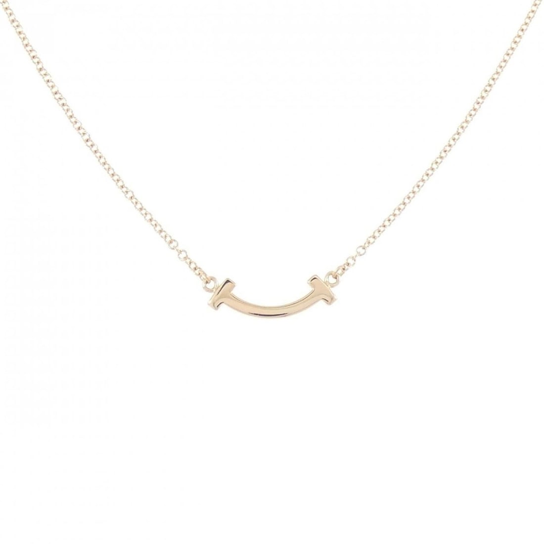 Tiffany T Smile Mini Necklace: --- Catalog ---Category: SizePendant Size: 3.5mm x 13.3mm / 0.13'' x 0.52''Neck Circumference: 41 cm - 47 cm / 16.14'' - 18.5''Category: DesignGender: WomenMaterial: Pink gold (18K)Pendant Type: Penda
