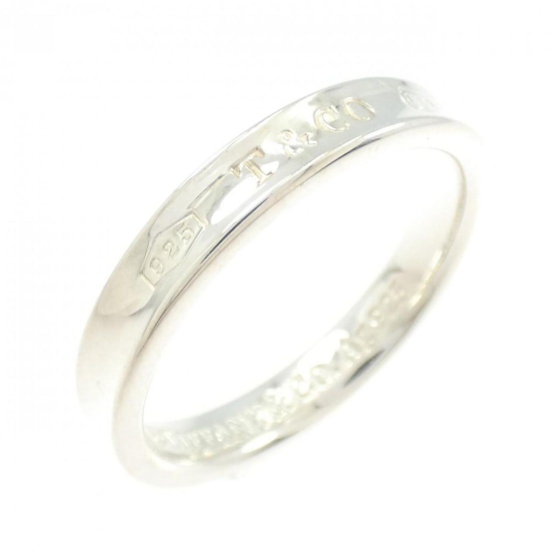 Tiffany & Co. 1837 Ring: --- Catalog ---Category: SizeJP Size: 21.0US Size: 10Category: DesignType: Band ringGender: WomenMaterial: Silver 925Category: GeneralBrand: Tiffany--- Item List ---Section: ConditionRanking: Rank A U