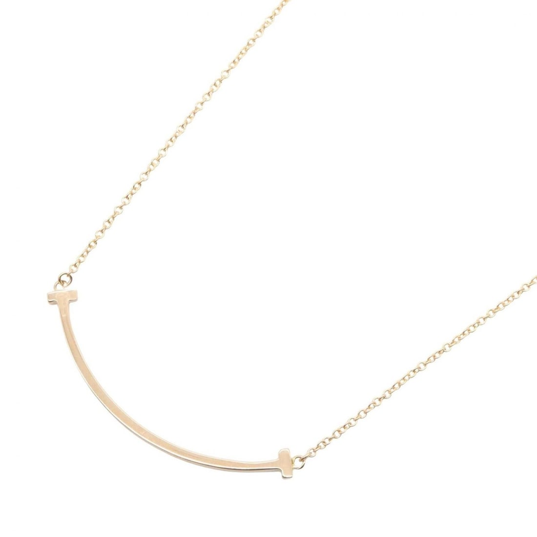 Tiffany & Co. T Smile Small Necklace, 18K Pink Gold (PG), Women's, Tone, 60011679: --- Catalog ---Category: SizePendant Size: 3mm x 37mm / 0.11'' x 1.45''Neck Circumference: 40 cm - 45 cm / 15.74'' - 17.71''Category: DesignColor: GoldGender: WomenMaterial: Pink gold (18K)Necklace Ty