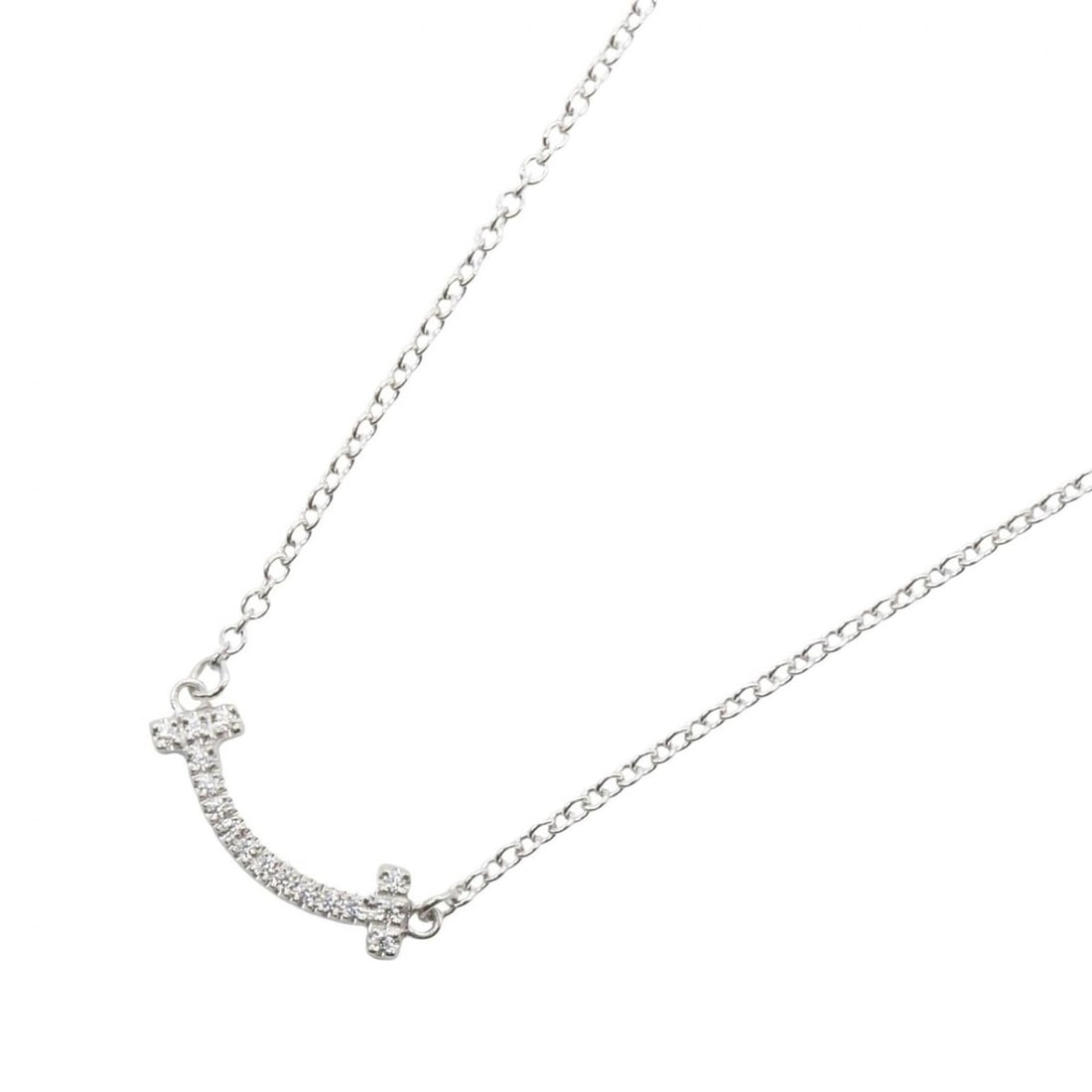 Tiffany & Co. T Smile Mini Necklace, Diamond 18K White Gold (18KWG), Women's, Silver/Clear Tone,: --- Catalog ---Category: SizePendant Size: 3mm x 13mm / 0.11'' x 0.51''Neck Circumference: 40.5 cm - 45.5 cm / 15.94'' - 17.91''Category: DesignColor: Clear, SilverGender: WomenMaterial: White gold (1
