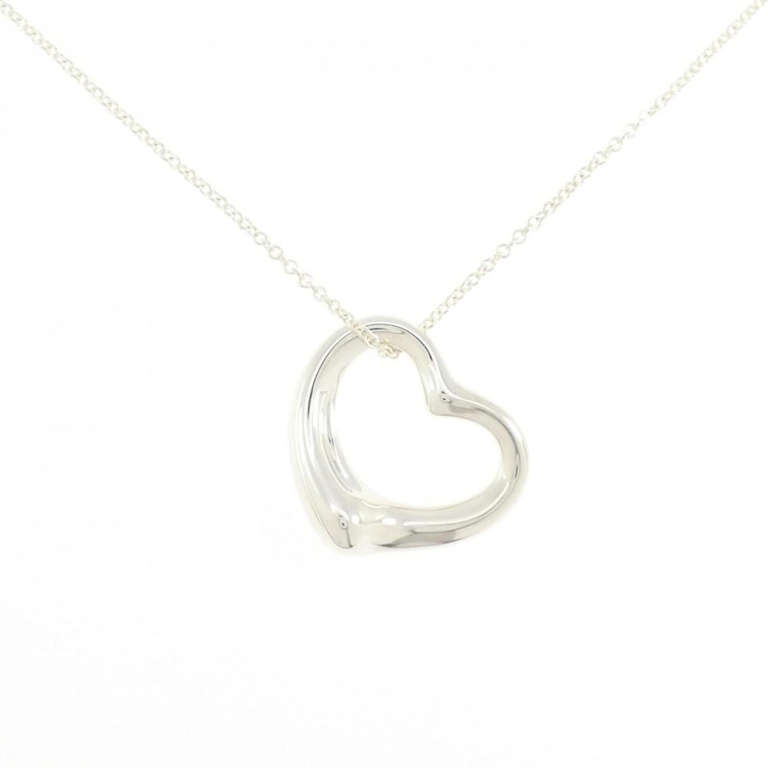 Tiffany Open Heart Necklace: --- Catalog ---Category: SizeWidth: 1.6mm / 0.06''Weight: 11.4g / 0.4oz.Pendant Size: 26.2mm x 25.8mm / 1.03'' x 1.01''Neck Circumference: 46 cm / 18.11''Category: DesignGender: WomenMaterial: Silver 