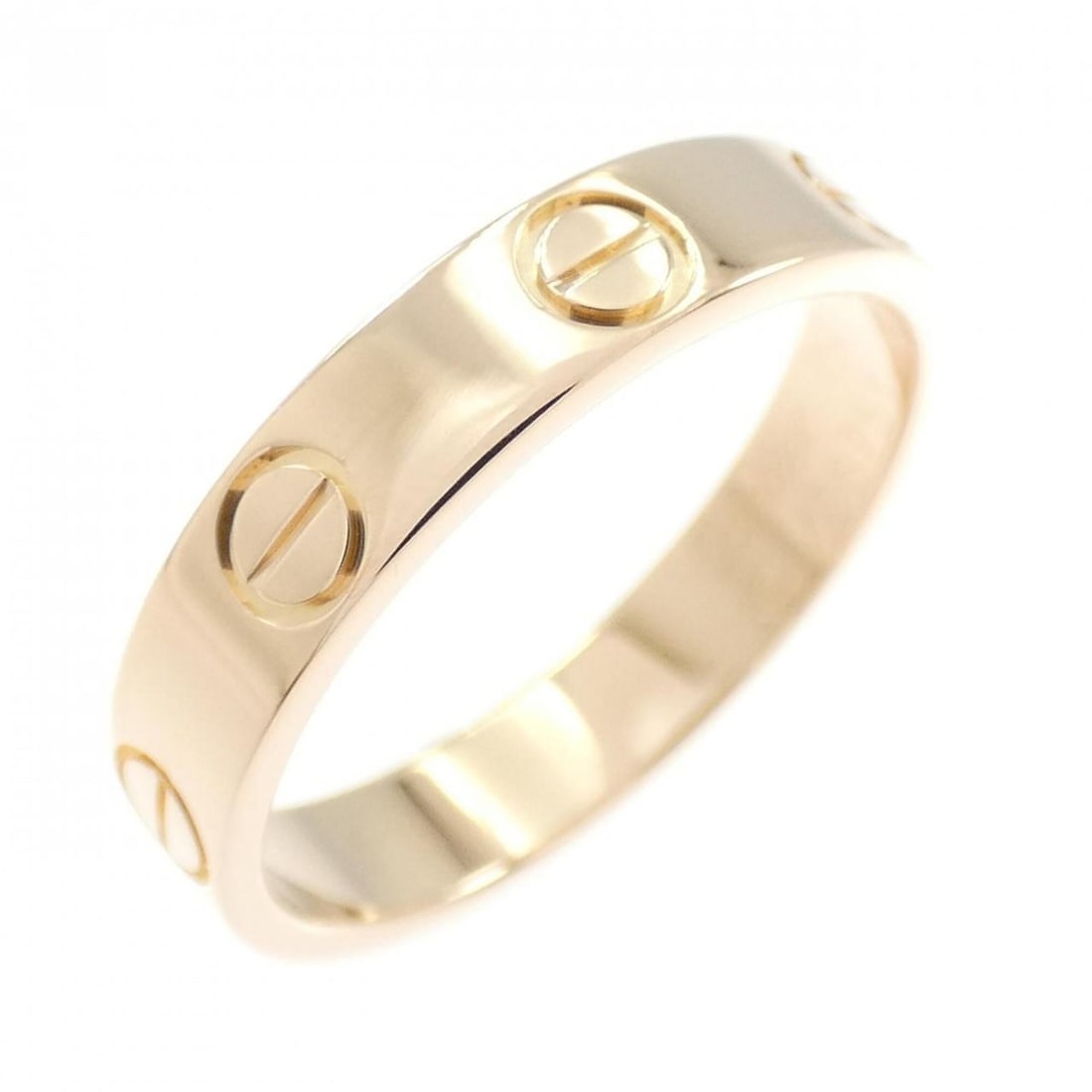 Cartier Mini Love Ring: --- Catalog ---Category: SizeWidth: 3.5mm / 0.14''Weight: 3.1g / 0.1oz.JP Size: 10US Size: 5.5Category: DesignType: Band ringGender: WomenMaterial: Pink gold (18K)Category: GeneralLine: LoveBrand: Car