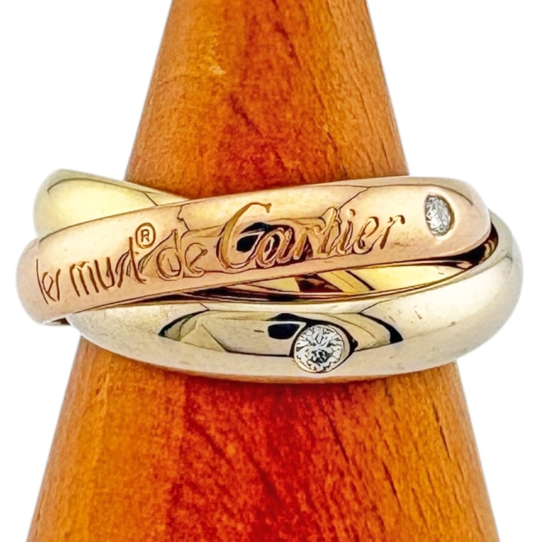 Cartier Trinity Ring, 18K Yellow Gold Ring with Diamonds, Women's CARTIER: --- Catalog ---Category: PackNumber in Pack: 1Category: SizeJP Size: 9.5US Size: 5Category: DesignType: Band ringColor: Gold, Pink gold, SilverGender: WomenMaterial: Pink gold (18K), White gold (18K),