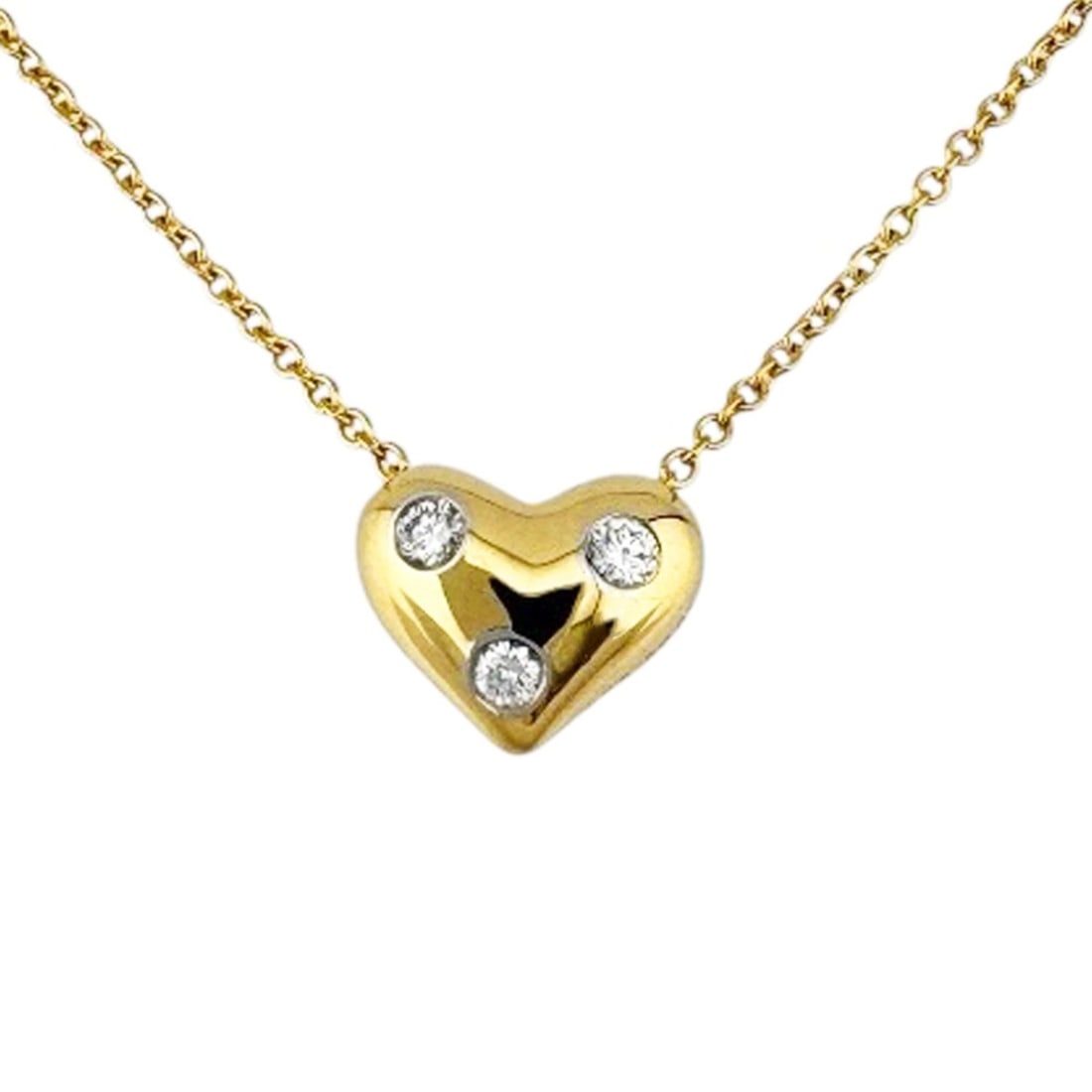 Tiffany & Co. Dots Pinched Heart Necklace, 18K Yellow Gold, Diamond, Women's.: --- Catalog ---Category: SizePendant Size: 8mm x 9.5mm / 0.31'' x 0.37''Neck Circumference: 40 cm / 15.74''Category: DesignColor: Yellow goldGender: WomenMaterial: Yellow gold (18K)Necklace Type: