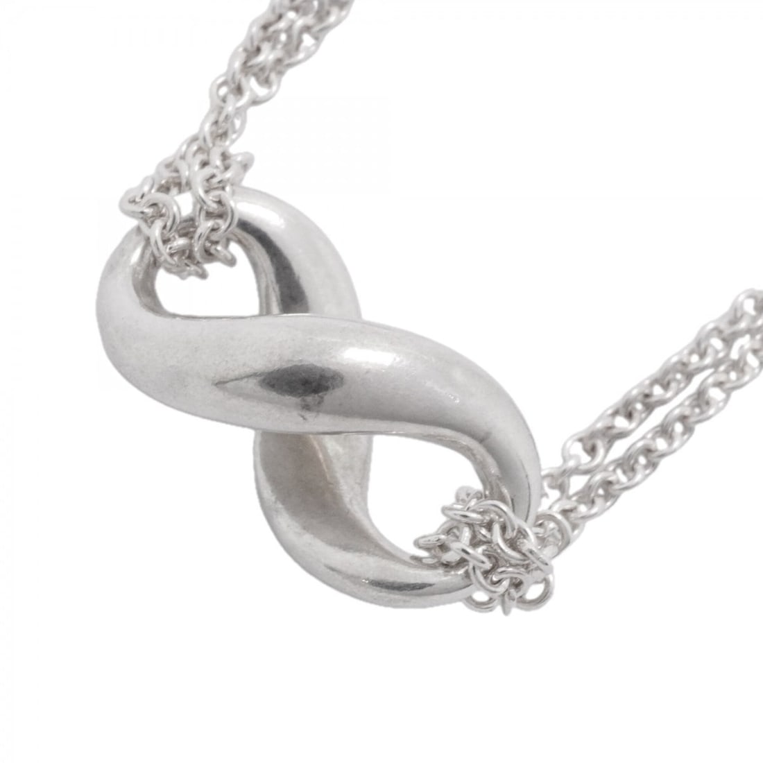Tiffany & Co. Infinity Double Chain Necklace, Sterling Silver 925, Women's: --- Catalog ---Category: SizePendant Size: 10mm x 18.5mm / 0.39'' x 0.72''Neck Circumference: 40.5 cm / 15.94''Category: DesignGender: WomenMaterial: Silver 925Necklace Type: NecklaceCategory: General