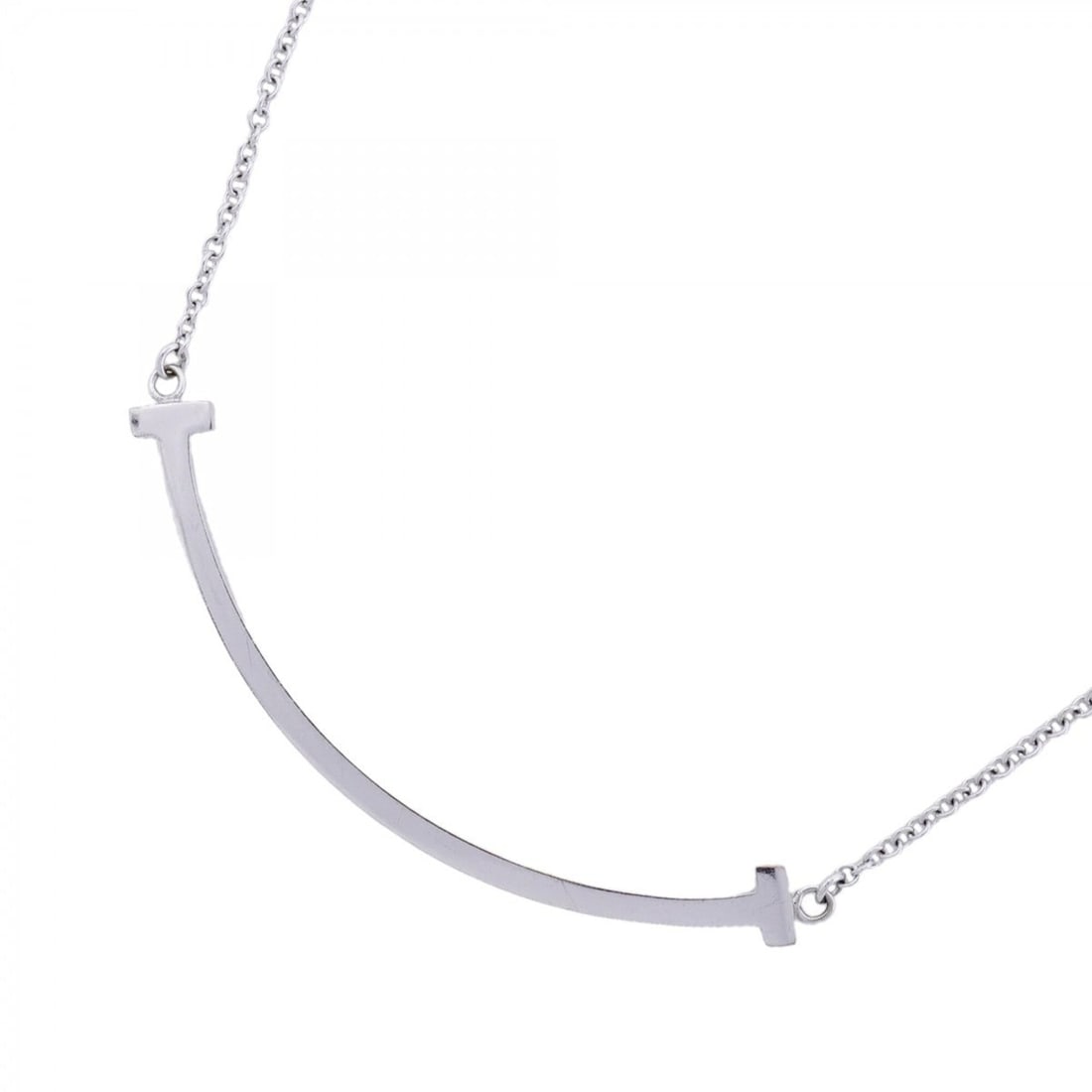 Tiffany & Co. T Smile Small Necklace, 18K White Gold, Women's: --- Catalog ---Category: SizePendant Size: 10mm x 37mm / 0.39'' x 1.45''Neck Circumference: 40.5 cm - 45.5 cm / 15.94'' - 17.91''Category: DesignGender: WomenMaterial: White gold (18K)Necklace Type: N