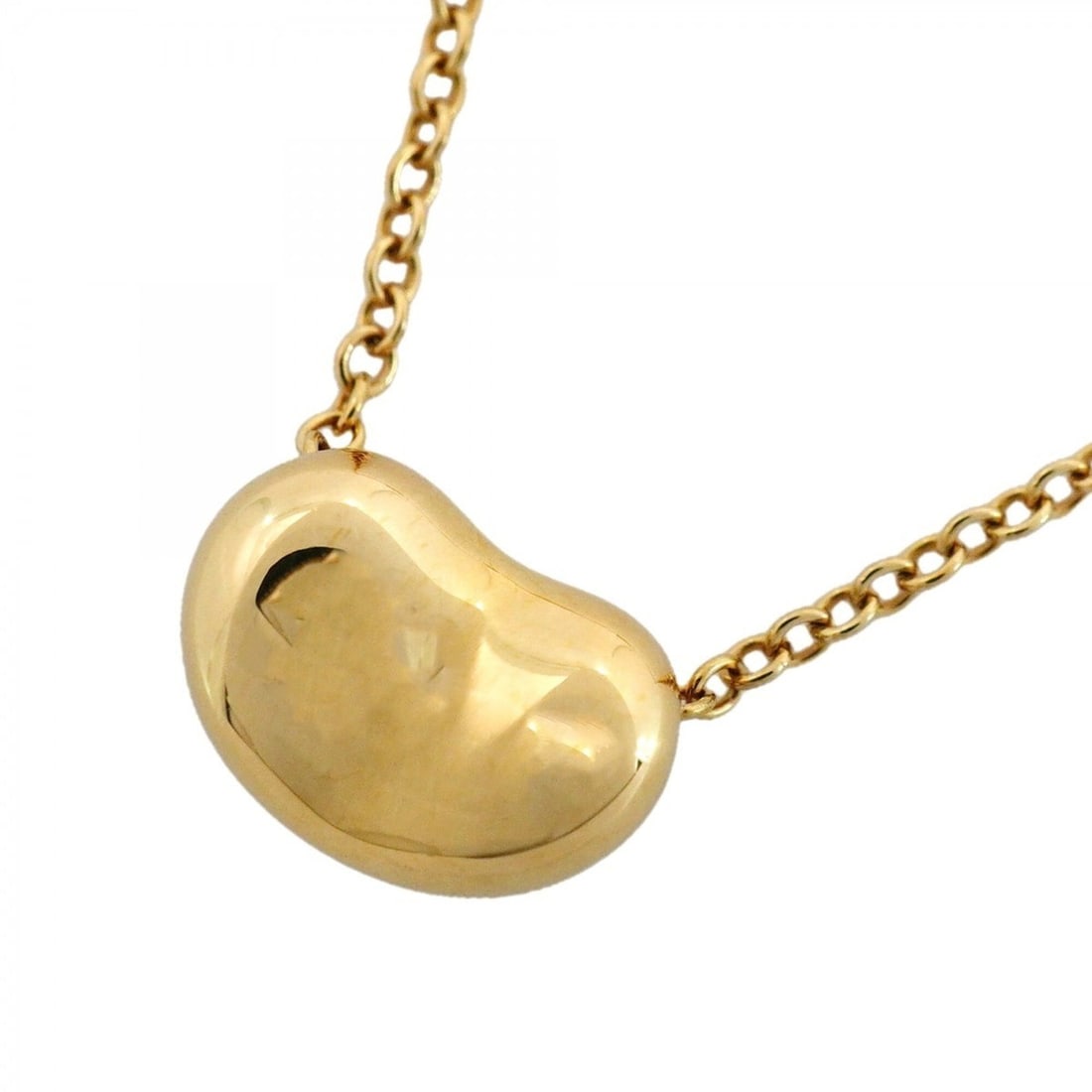Tiffany & Co. Bean Necklace, 18K Yellow Gold, Women's: --- Catalog ---Category: SizePendant Size: 6.4mm x 9.2mm / 0.25'' x 0.36''Neck Circumference: 43.5 cm / 17.12''Category: DesignGender: WomenMaterial: Yellow gold (18K)Necklace Type: NecklaceCategory: 