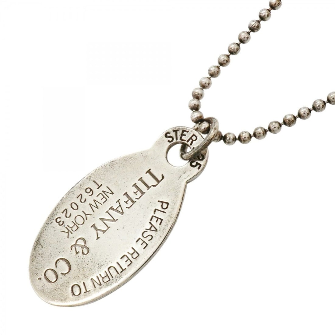 Tiffany & Co. Return to Dreams Ball Chain Oval Sterling Silver Necklace for Women: --- Catalog ---Category: SizePendant Size: 48mm x 21.1mm / 1.88'' x 0.83''Neck Circumference: 86 cm / 33.85''Category: DesignGender: WomenMaterial: Silver 925Necklace Type: NecklaceCategory: GeneralBr