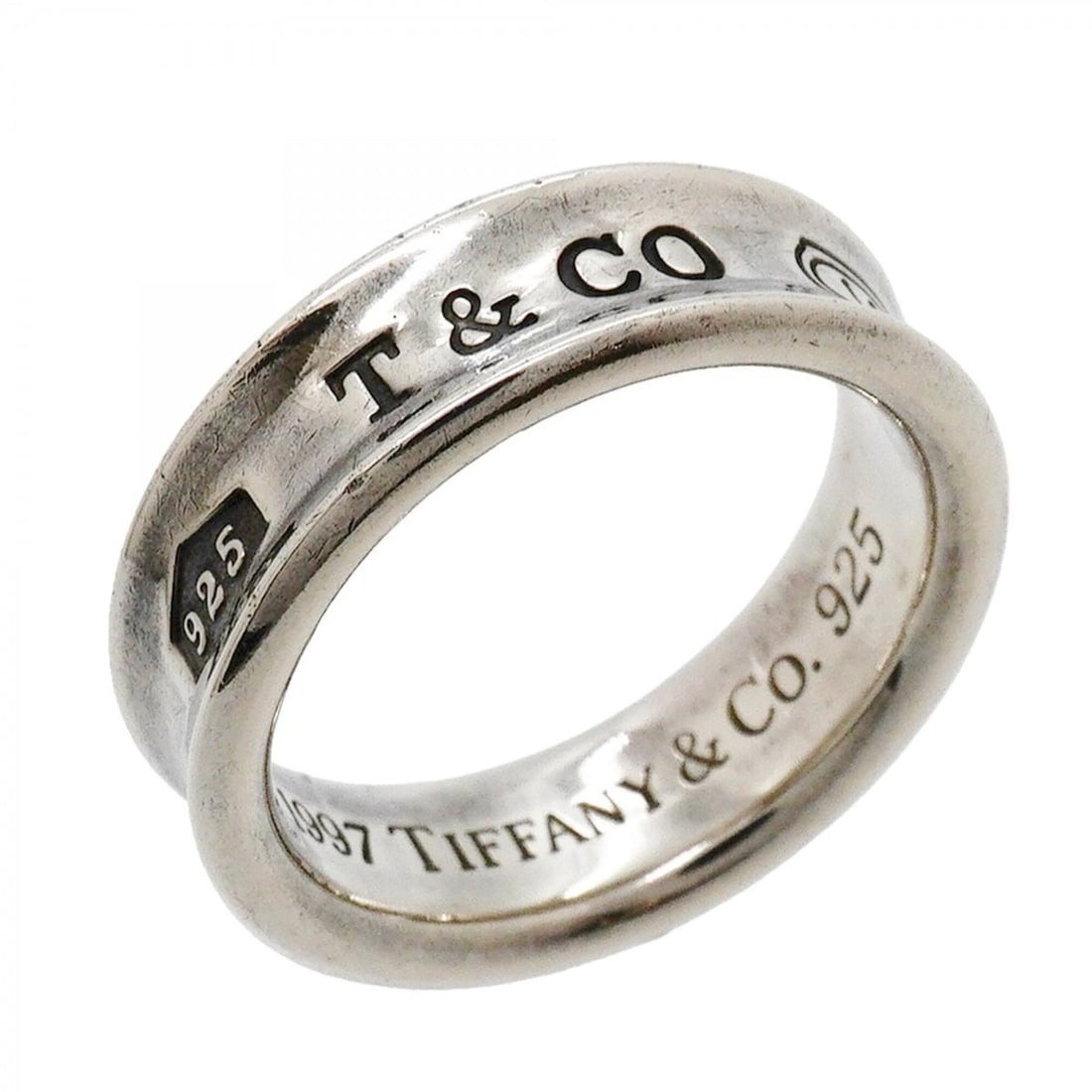 Tiffany & Co. Narrow Ring, Sterling Silver 925, Size 18.5 (Men's): --- Catalog ---Category: SizeJP Size: 18.5US Size: 9Category: DesignType: Band ringGender: MenMaterial: Silver 925Category: GeneralBrand: Tiffany--- Item List ---Section: ConditionRanking: Rank AB Use