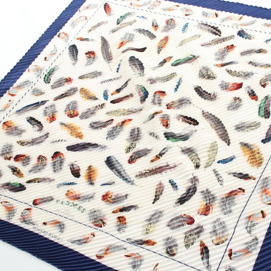 Hermes Carre Plissé Plumes Scarf/Muffler, Silk, Women's, Navy/Ivory/Multicolor: --- Catalog ---Category: SizeSize (LxW): 1.3m / 51.18''Category: DesignType: ScarfColor: Ivory, Multi-color, NavyGender: WomenMaterial: Silk Category: GeneralBrand: Hermes--- Item List ---Section: Con