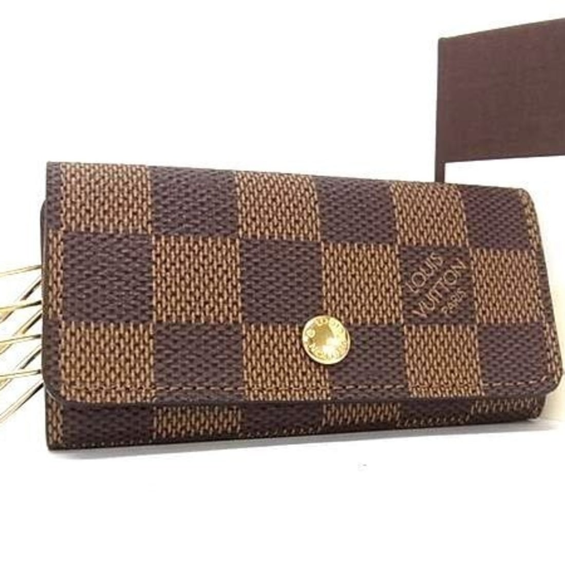 LOUIS VUITTON Louis Vuitton Key Case Damier Multicles 4 N62631 Ebene Leather Men's Women's: --- Catalog ---Category: DesignType: KeycaseColor: EbeneGender: Men,Women,UnisexMaterial: PVC , Leather Number of Key Hooks: 4Category: GeneralBrand: Louis VuittonCountry of Origin: FranceCategory: Ph