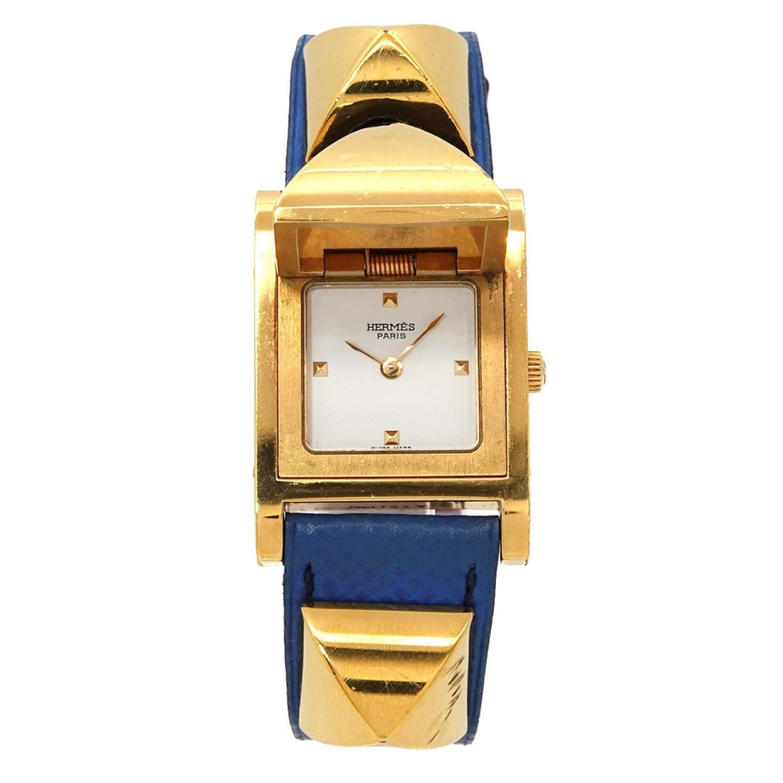 Hermes Medor Women's Watch, Pyramid Design, Gold Studs, White and Blue Leather Strap, Quartz: --- Catalog ---Category: SizeWrist Size: 14cm - 16.5cm / 5.51'' - 6.49''Case Diameter: 23mm / 0.91''Category: DesignType: WristwatchGender: WomenColor (Dial): WhiteMaterial (Band): Gold plated, Leathe