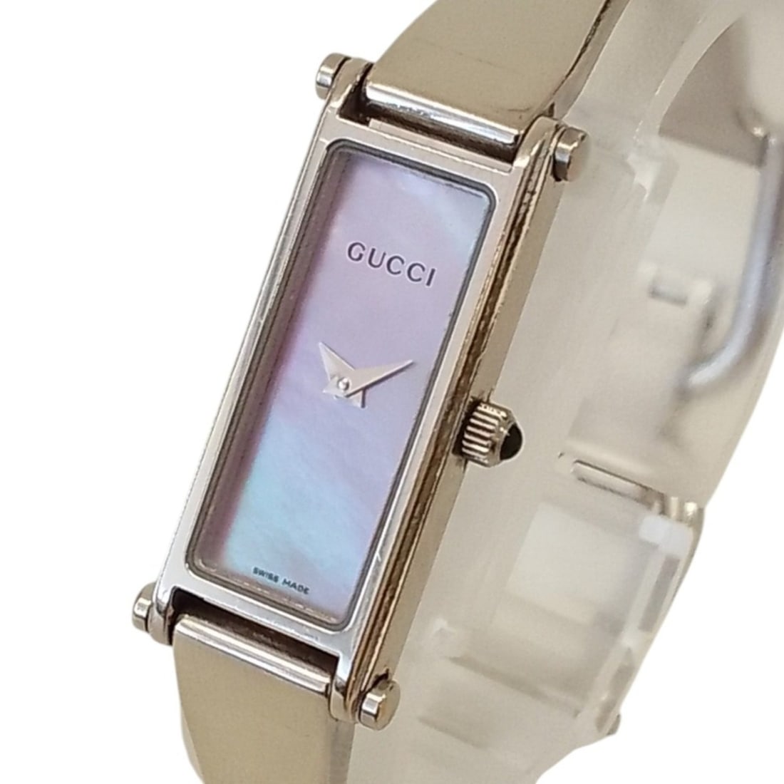 GUCCI 1500L Quartz Watch, Women's Pink Mother-of-Pearl Dial, Stainless Steel, Silver Color: --- Catalog ---Category: SizeWrist Size: 15.5cm / 6.1''Case Diameter: 12mm / 0.47''Category: DesignType: WristwatchGender: WomenColor (Dial): PinkCategory: GeneralBrand: GucciCategory: MovementMovemen
