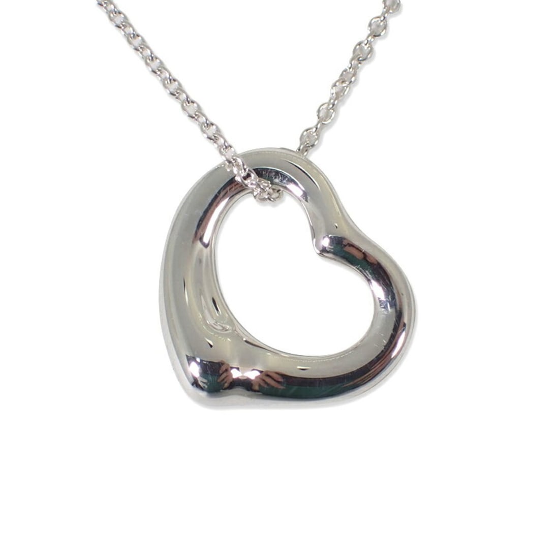 TIFFANY & Co. 925 Heart Pendant Necklace: --- Catalog ---Category: SizePendant Size: 14.2mm x 15.9mm / 0.55'' x 0.62''Neck Circumference: 40.5 cm / 15.94''Category: DesignGender: WomenMaterial: Sterling silver 925Necklace Type: Pendant neckla