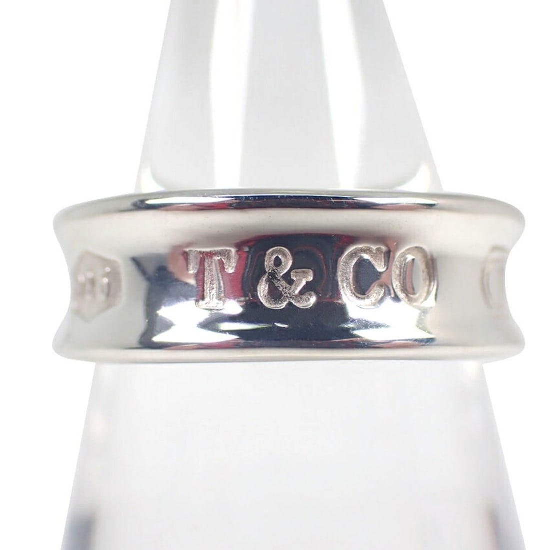TIFFANY & Co. 925 1837 Ring, Size 12: --- Catalog ---Category: SizeUS Size: 6.5Brand Size: 52Category: DesignType: Band ringGender: WomenMaterial: Sterling silver 925Category: GeneralBrand: Tiffany--- Item List ---Section: ConditionRankin