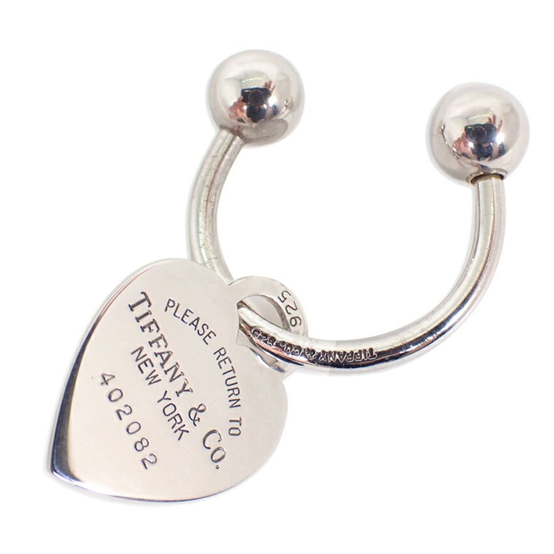 TIFFANY & Co. 925 Return to Tiffany Heart Tag Keyring: --- Catalog ---Category: SizeSize (HxWxD): 26.9cm x 20.3cm / 10.59'' x 7.99''Category: DesignType: KeyringGender: Men,WomenMaterial: Sterling silver 925Category: GeneralBrand: Tiffany--- Item List ---