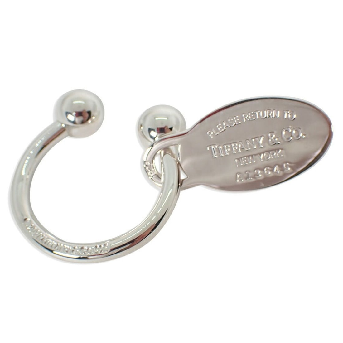 TIFFANY & Co. 925 Oval Tag Keyring: --- Catalog ---Category: SizeSize (HxWxD): 34.7cm x 31.8cm / 13.66'' x 12.51''Category: DesignType: KeyringGender: Men,WomenMaterial: Sterling silver 925Category: GeneralBrand: Tiffany--- Item List --