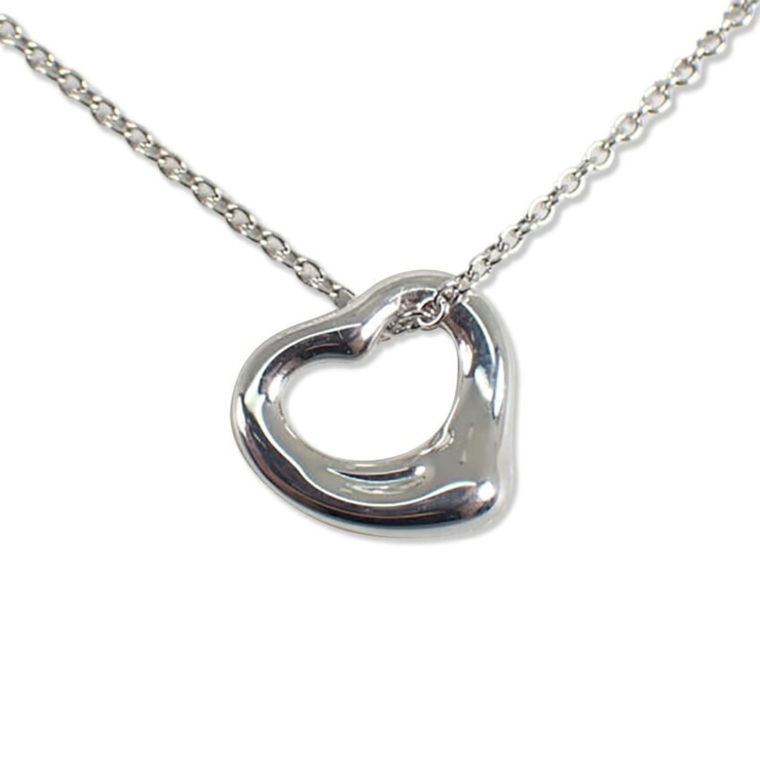TIFFANY & Co. 925 Heart Pendant Necklace: --- Catalog ---Category: SizePendant Size: 9.9mm x 11.1mm / 0.38'' x 0.43''Category: DesignGender: WomenMaterial: Sterling silver 925Necklace Type: Pendant necklaceCategory: GeneralBrand: Tiffany--- I
