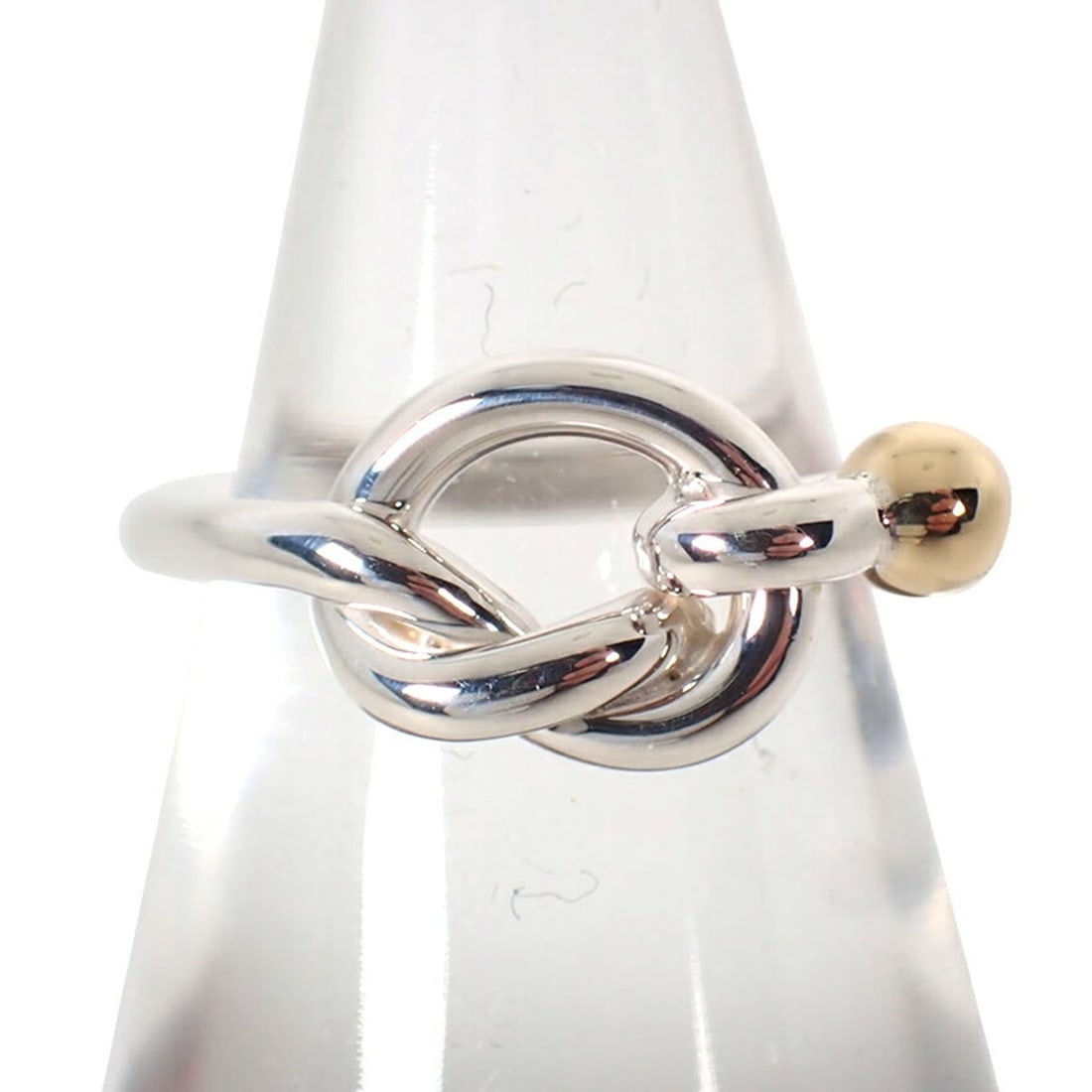 TIFFANY & Co. 925 750 Love Knot Ring, Size 9: --- Catalog ---Category: SizeUS Size: 5Brand Size: 49Category: DesignType: Band ringGender: WomenMaterial: Sterling silver 925, Yellow gold (18K)Category: GeneralBrand: Tiffany--- Item List ---Section