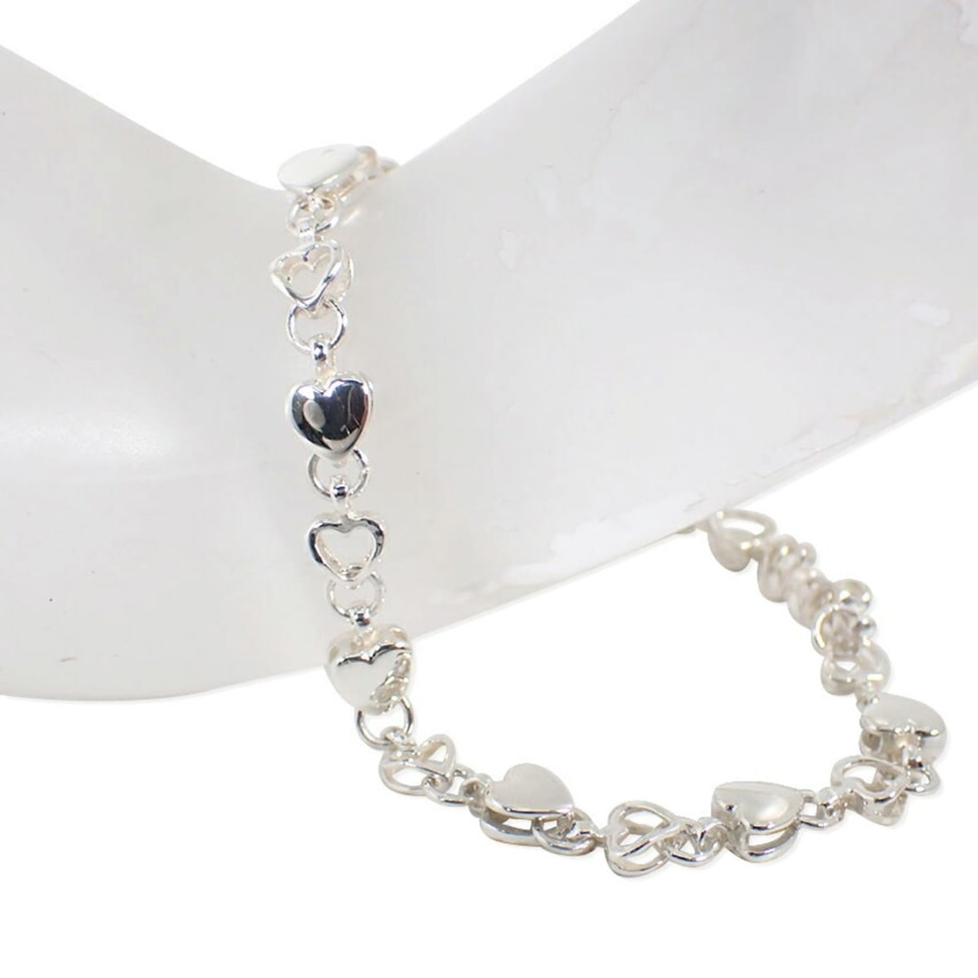 TIFFANY & Co. 925 Puff Heart Bracelet: --- Catalog ---Category: SizeLength: 19cm / 7.48''Category: DesignType: Charm braceletGender: WomenMaterial: Sterling silver 925Category: GeneralBrand: Tiffany--- Item List ---Section: ConditionRankin