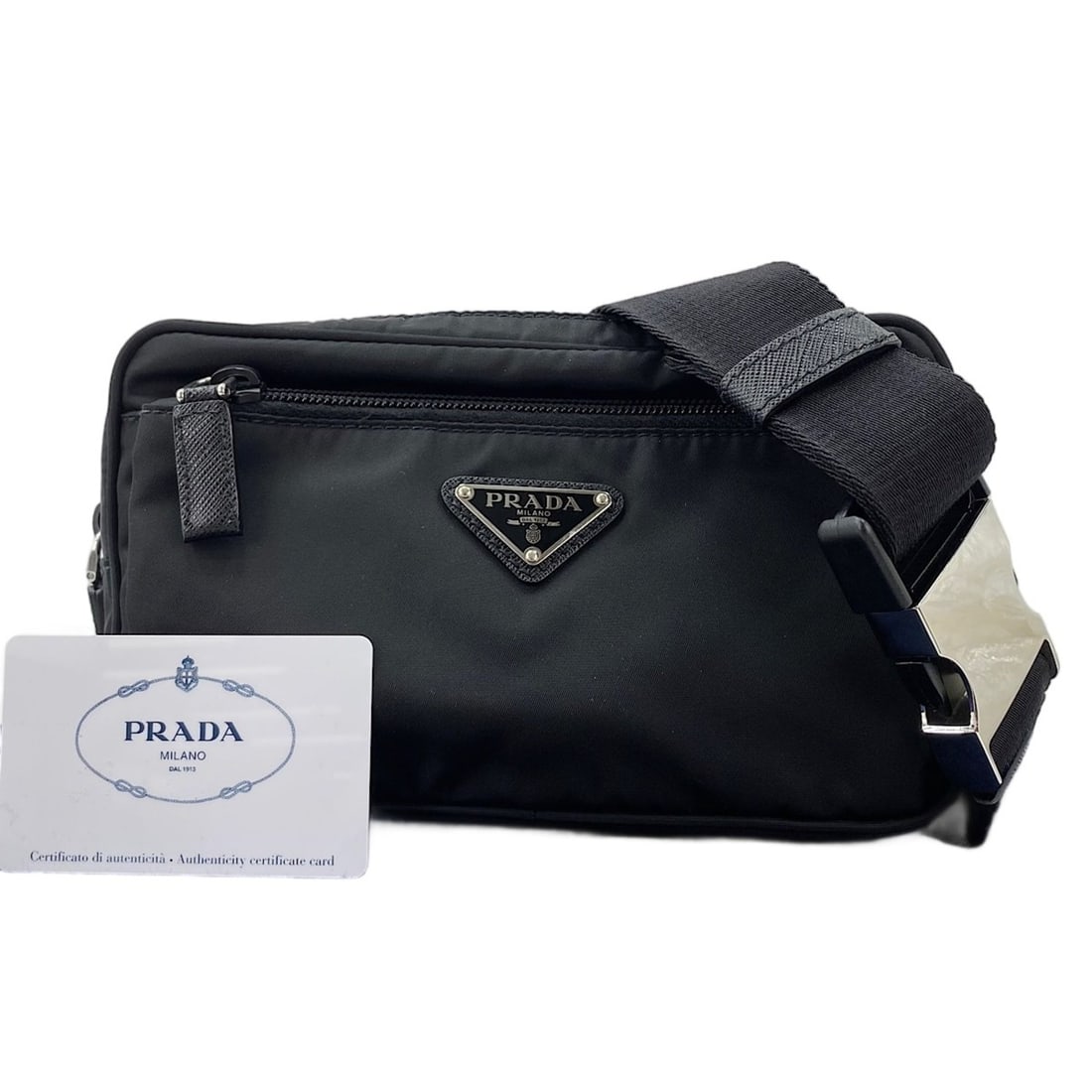 Prada PRADA nylon waist bag, black: --- Catalog ---Category: SizeSize (HxWxD): 12cm x 21cm x 4cm / 4.72'' x 8.26'' x 1.57''Category: DesignType: Fanny packColor: BlackGender: Women,MenCategory: GeneralBrand: Prada--- Item List ---Sectio