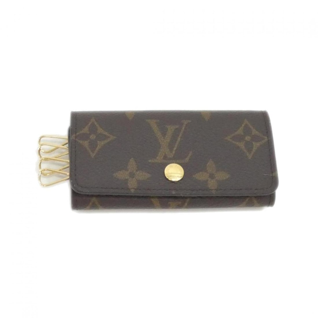 Louis Vuitton Monogram Multicles M62631 Key Case: --- Catalog ---Category: DesignType: KeycaseColor: BrownGender: Women,MenMaterial: Coated canvas Category: GeneralMPN: M62631Brand: Louis VuittonCategory: Physical PropertiesSize (HxWxD): 6cm x 11cm x