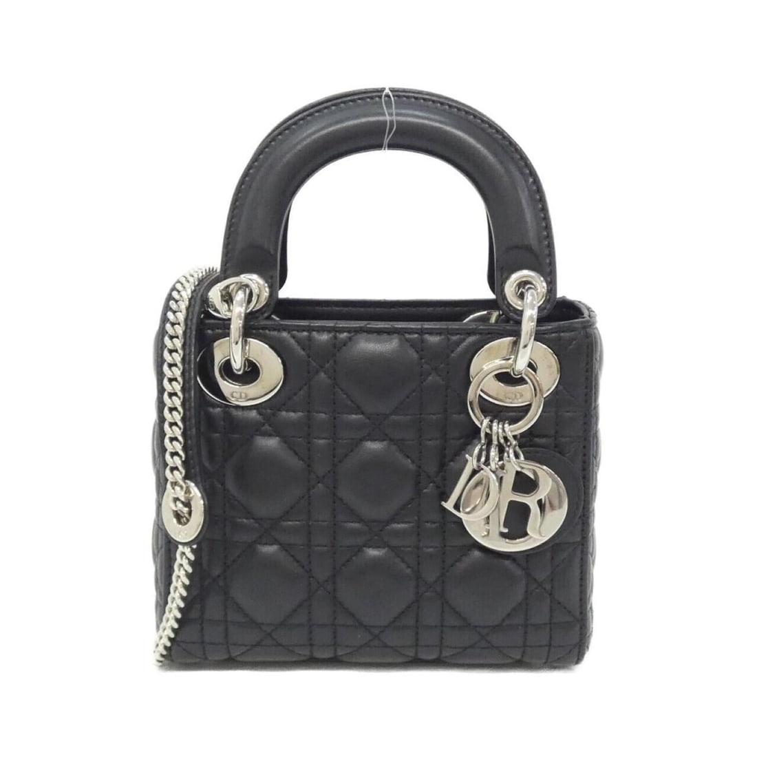 Christian Dior Lady Mini M0505PCAL Handbag: --- Catalog ---Category: SizeSize (HxWxD): 15cm x 17cm x 7cm / 5.9'' x 6.69'' x 2.75''Category: DesignType: HandbagColor: BlackGender: WomenMaterial: Leather Leather/Fur Type: LambskinCategory: Genera