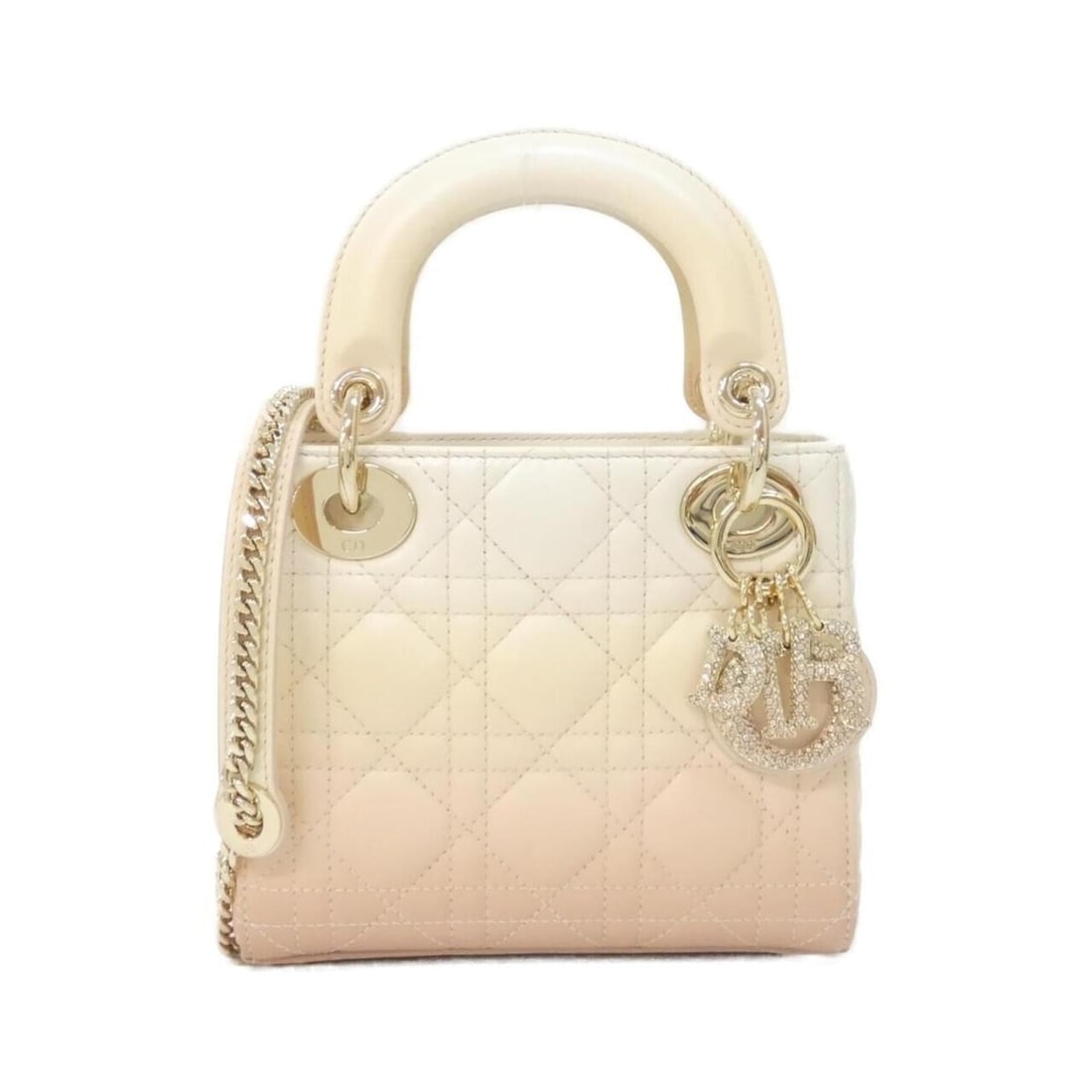 Christian Dior Lady Mini M0505OQDI Handbag: --- Catalog ---Category: SizeSize (HxWxD): 15cm x 17cm x 7cm / 5.9'' x 6.69'' x 2.75''Category: DesignType: HandbagColor: Pink, WhiteGender: WomenMaterial: Leather Leather/Fur Type: LambskinCategory: 