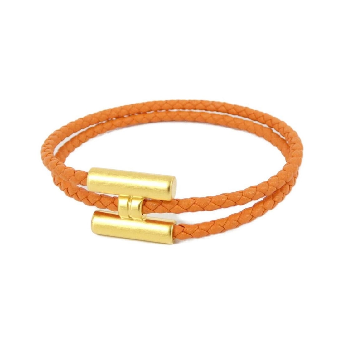 Hermes Tourni Tresse 068406FM Bracelet: --- Catalog ---Category: SizeWidth: 1.8cm / 0.7''Total Length: 18cm / 7.08''Category: DesignType: Charm braceletColor: OrangeGender: Women,MenMaterial: Swift leatherCategory: GeneralBrand: Hermes--- I