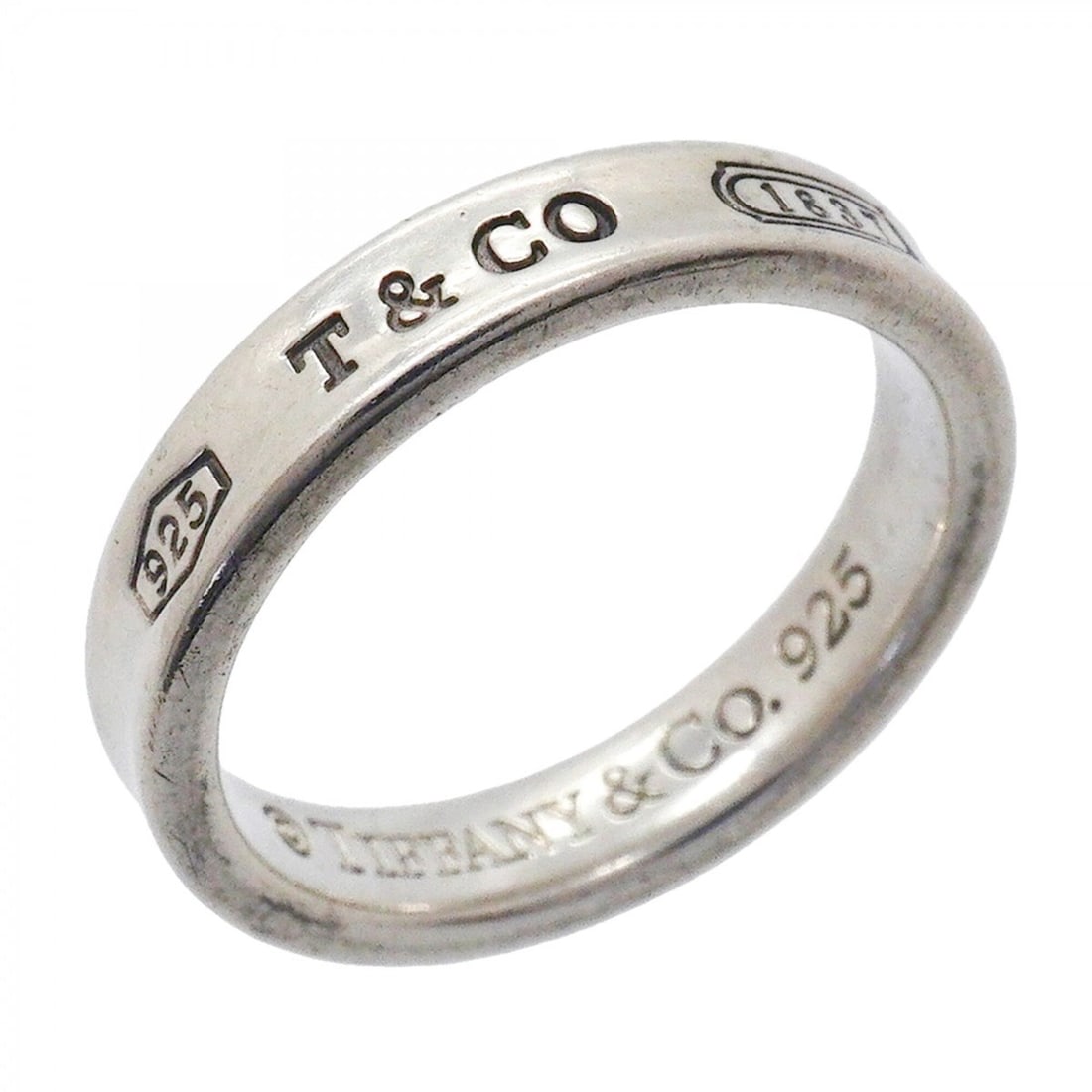 Tiffany & Co. Narrow Ring, Sterling Silver 925, Size 11.5 (Women's): --- Catalog ---Category: SizeJP Size: 11.5US Size: 6Category: DesignType: Band ringGender: WomenMaterial: Silver 925Category: GeneralBrand: Tiffany--- Item List ---Section: ConditionRanking: Rank AB U