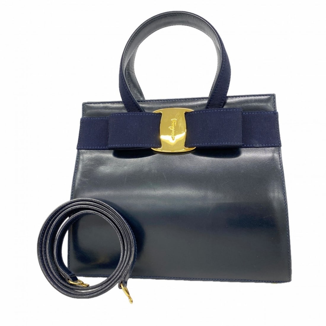 Salvatore Ferragamo Vara Leather Handbag, Navy, 2-way bag for women: --- Catalog ---Category: SizeSize (HxWxD): 21cm x 24.5cm x 9.5cm / 8.26'' x 9.64'' x 3.74''Category: DesignType: HandbagColor: NavyGender: WomenMaterial: Leather Hardware Color: GoldCategory: GeneralB