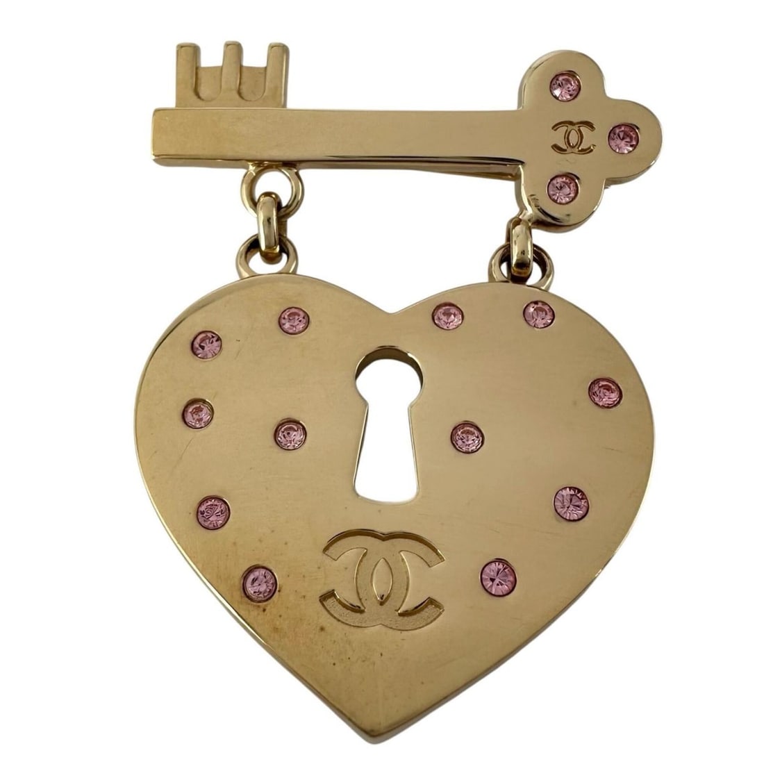 CHANEL Heart Lock Coco Mark Brooch 12096 GP Gold Pink Women's: --- Catalog ---Category: SizeSize (HxWxD): 6cm x 3.5cm / 2.36'' x 1.37''Category: DesignType: BroochColor: Gold, PinkGender: WomenMaterial: Gold platingCategory: GeneralMPN: 12096Brand: ChanelCountry 