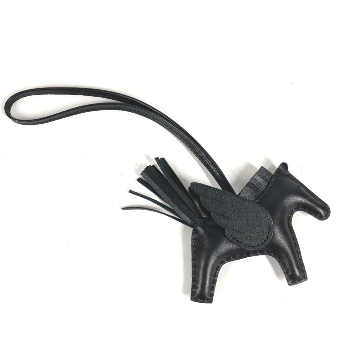 HERMES Hermes Horse Keychain Cheval Rodeo Pegasus PM Accessory Bag Charm So Black All Agneau Milo: --- Catalog ---Category: DesignType: Handbag charmColor: BlackGender: Men,Women,UnisexMaterial: Agneau MiloCategory: GeneralBrand: HermesCountry of Origin: France--- Item List ---Section: ConditionRan