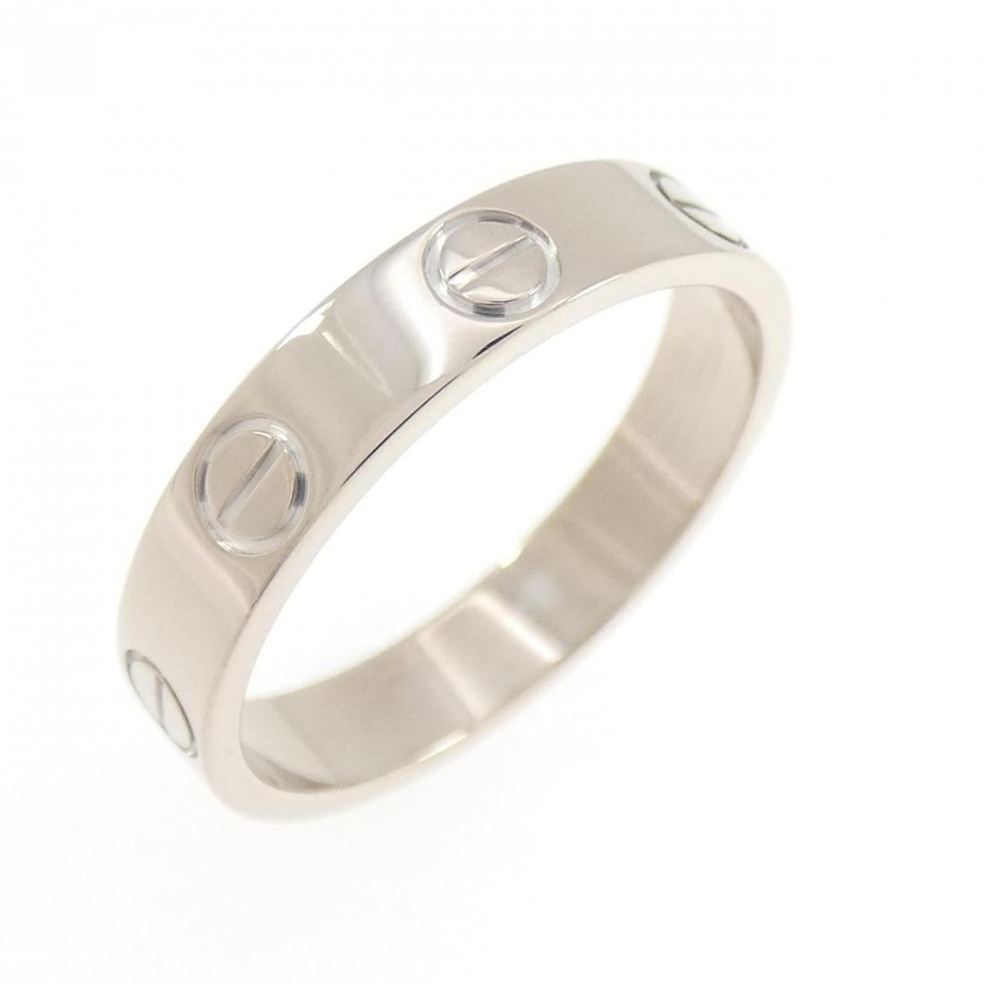 Cartier Mini Love Ring: --- Catalog ---Category: SizeUS Size: 5.5Brand Size: 50Category: DesignType: Band ringGender: WomenMaterial: White gold (18K)Category: GeneralBrand: Cartier--- Item List ---Section: ConditionRanking: