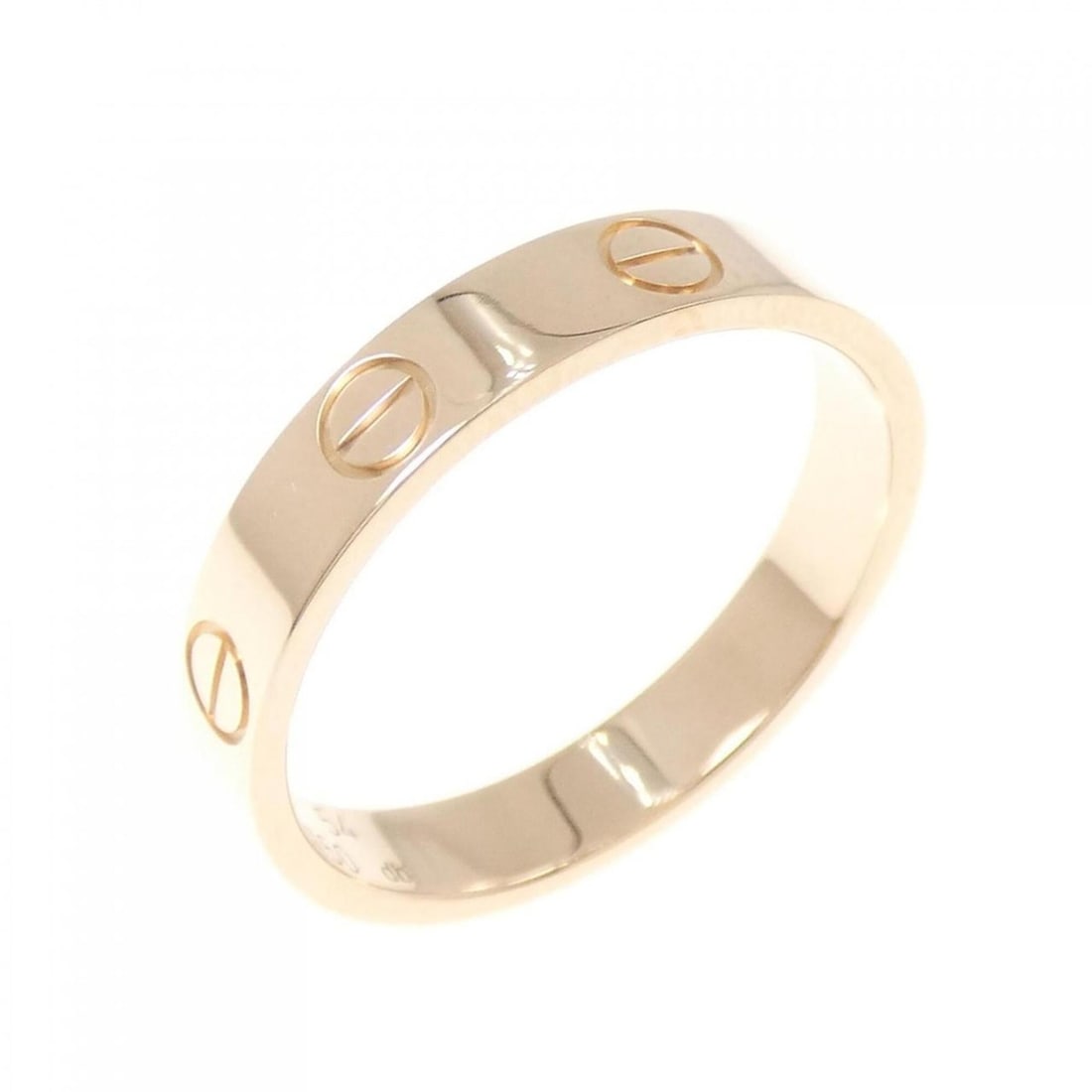 Cartier Mini Love Ring: --- Catalog ---Category: SizeUS Size: 7Brand Size: 54Category: DesignType: Band ringGender: WomenMaterial: Pink gold (18K)Category: GeneralBrand: Cartier--- Item List ---Section: ConditionRanking: Ran