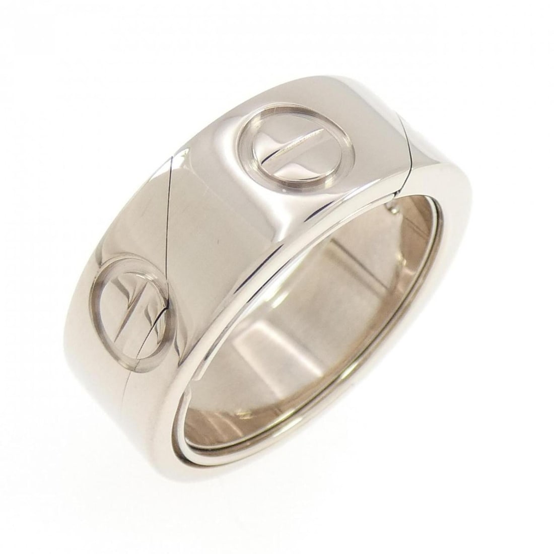 Cartier Astrolove 1999 Christmas Limited Edition Ring: --- Catalog ---Category: SizeUS Size: 5.5Brand Size: 50Category: DesignType: Band ringGender: WomenMaterial: White gold (18K)Category: GeneralBrand: Cartier--- Item List ---Section: ConditionRanking: