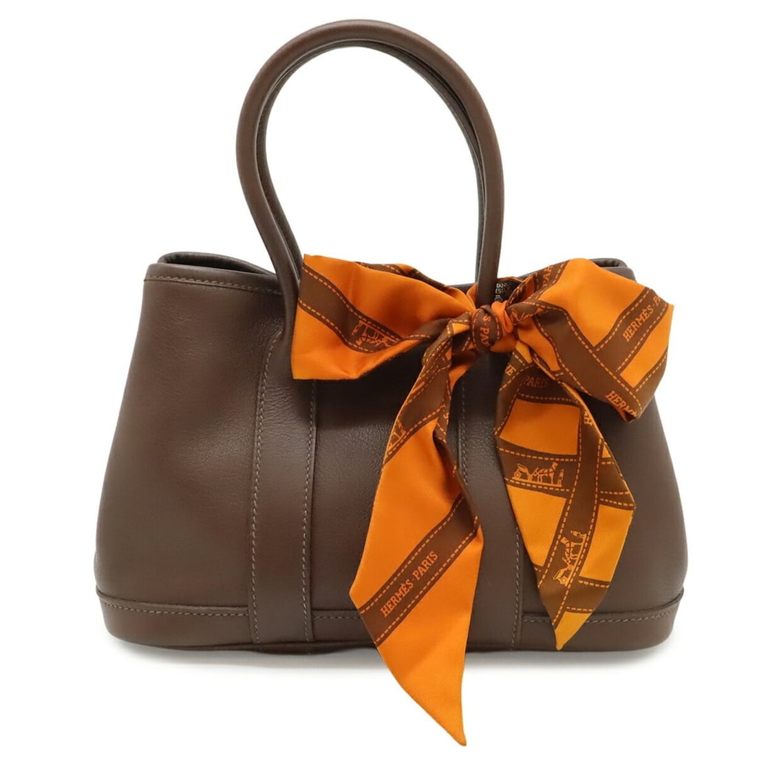 HERMES Hermes Garden Twilly TTPM Handbag Swift Leather Havana Brown Orange Bolduc H Stamp: --- Catalog ---Category: SizeSize (HxWxD): 15.5cm x 23cm x 10.5cm / 6.1'' x 9.05'' x 4.13''Category: DesignType: HandbagColor: Brown, Havane, OrangeGender: WomenMaterial: Swift leather , Silk Category