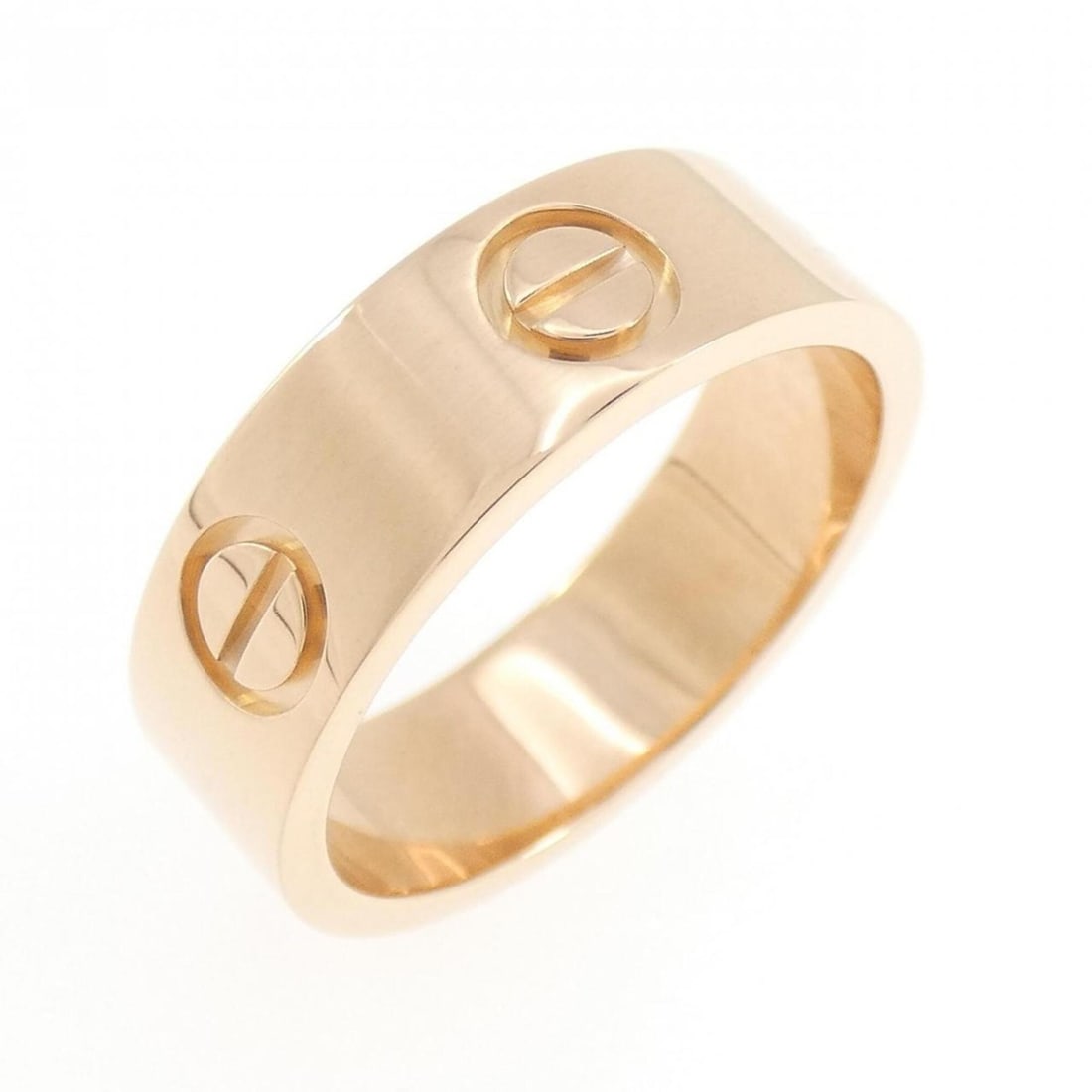 Cartier Love Ring: --- Catalog ---Category: SizeUS Size: 5.5Brand Size: 50Category: DesignType: Band ringColor: Pink goldGender: WomenMaterial: Pink gold (18K)Category: GeneralBrand: Cartier--- Item List ---Section: