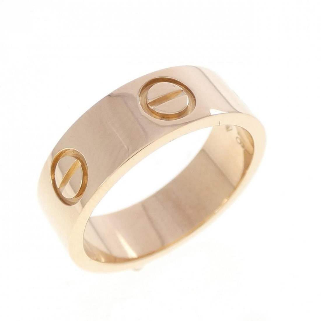Cartier Love Ring: --- Catalog ---Category: SizeUS Size: 4.5Brand Size: 48Category: DesignType: Band ringColor: Pink goldGender: WomenMaterial: Pink gold (18K)Category: GeneralBrand: Cartier--- Item List ---Section:
