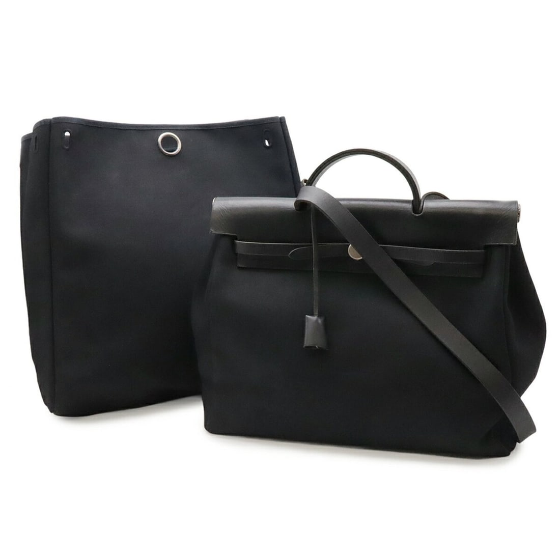 HERMES Herbag MM handbag/shoulder bag, Toile Officier canvas and leather, black, stopper missing,: --- Catalog ---Category: SizeSize (HxWxD): 34cm x 38cm x 12.5cm / 13.38'' x 14.96'' x 4.92''Strap Length: 96cm / 37.79''Category: DesignType: Handbag, Shoulder bagColor: BlackStyle: CasualGender: Wome