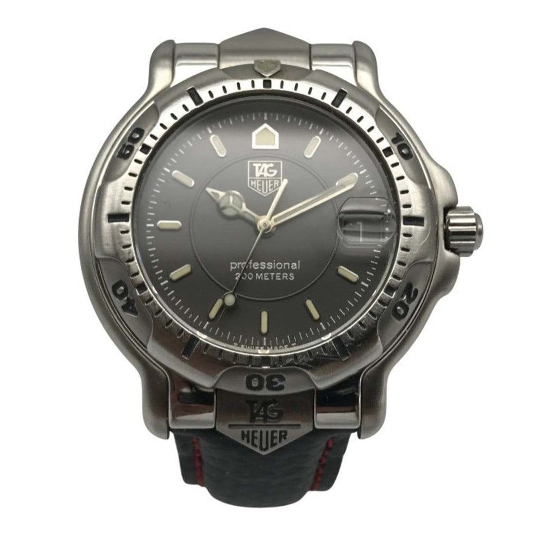 TAG Heuer 6000 Series Professional Men's Analog Quartz Watch with Date, Silver/Gray WH1112 T1: --- Catalog ---Category: SizeCase Diameter: 40mm / 1.57''Category: DesignType: WristwatchGender: MenColor (Dial): GrayMaterial (Case): Stainless steelCategory: GeneralMPN: WH1112Brand: Tag HeuerCountr
