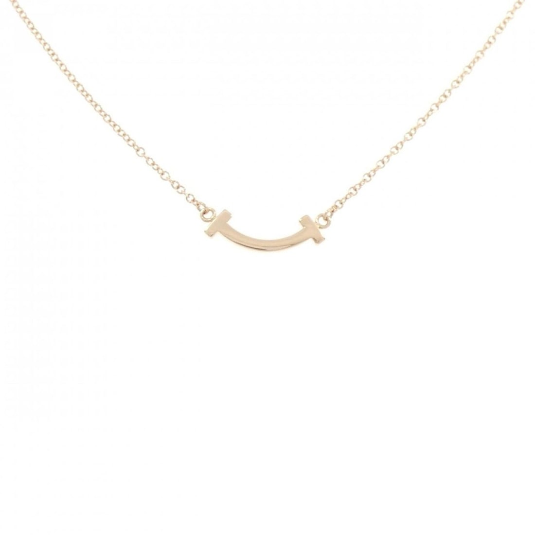 Tiffany T Smile Mini Necklace: --- Catalog ---Category: SizePendant Size: 3.6mm x 13.3mm / 0.14'' x 0.52''Neck Circumference: 41 cm - 46 cm / 16.14'' - 18.11''Category: DesignColor: Pink goldGender: WomenMaterial: Pink gold