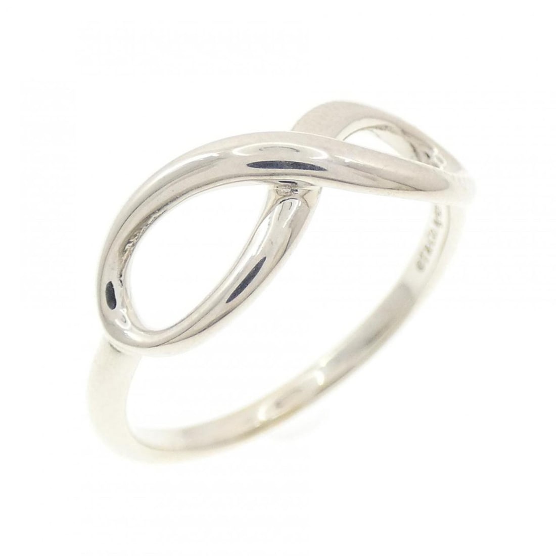 Tiffany Infinity Ring: --- Catalog ---Category: SizeJP Size: 15US Size: 7.5Category: DesignType: Band ringColor: SilverGender: Women,MenMaterial: Silver 925Category: GeneralBrand: Tiffany--- Item List ---Section: ConditionR
