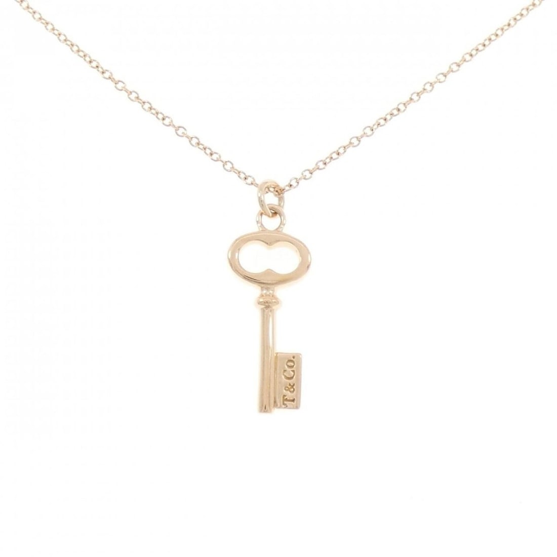 Tiffany Vintage Oval Key Mini Necklace: --- Catalog ---Category: SizePendant Size: 23.3mm x 8.3mm / 0.91'' x 0.32''Neck Circumference: 42 cm / 16.53''Category: DesignColor: Pink goldGender: WomenMaterial: Pink gold (18K)Pendant Type: