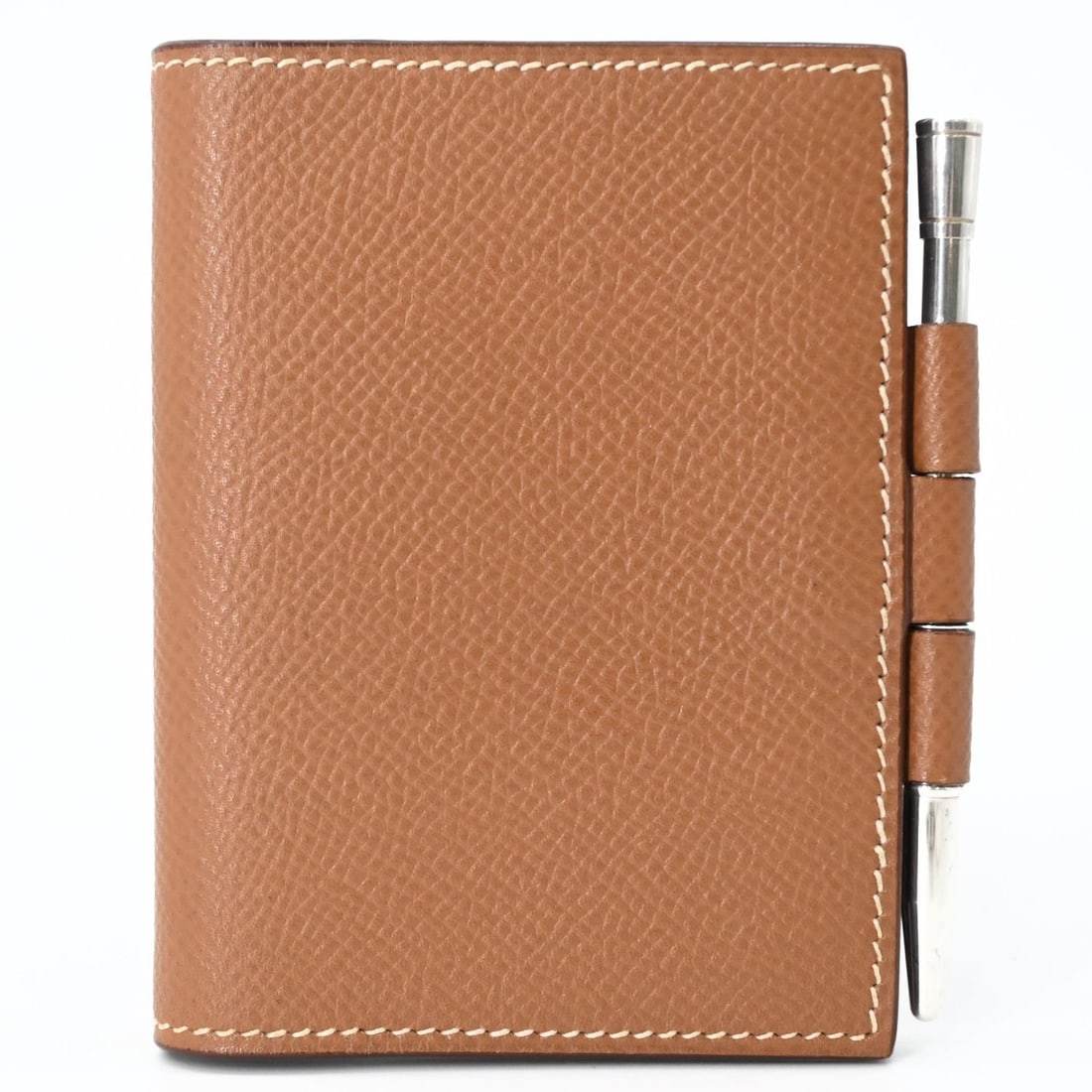 HERMES Agenda PM Veau Epsom Notebook Cover Compact Ballpoint Pen Gold Brown: --- Catalog ---Category: DesignColor: Brown, Gold brownGender: WomenMaterial: Epsom leather Category: GeneralBrand: HermesCountry of Origin: FranceCategory: Physical PropertiesSize (HxWxD): 9.8cm x 7c