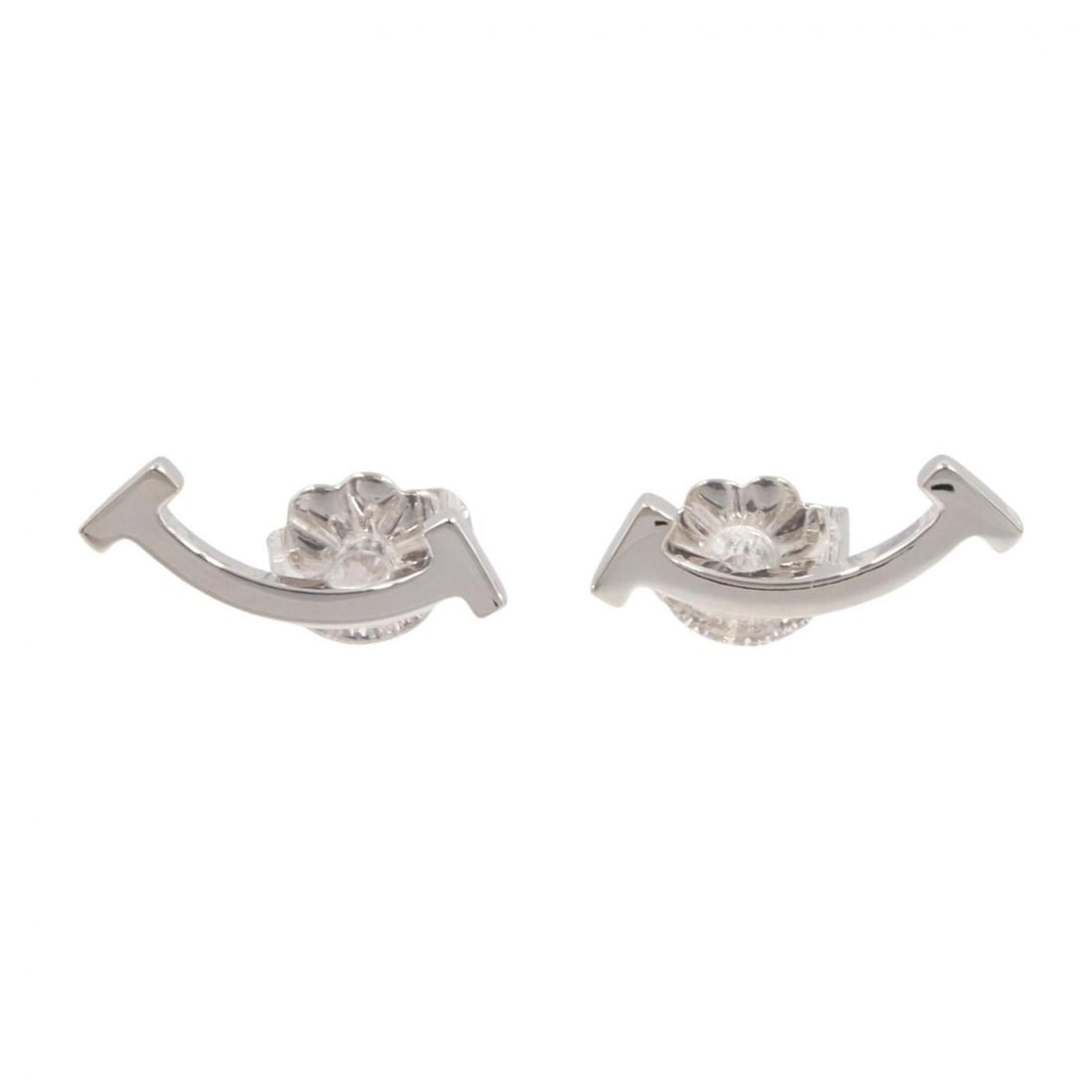 Tiffany & Co. T Smile Mini Earrings, 18K White Gold (WG), Women's, Silver Tone: --- Catalog ---Category: SizeSize (HxWxD): 3.00mm x 13.00mm / 0.12'' x 0.51''Category: DesignType: Stud earringsColor: SilverGender: WomenMaterial: White gold (18K)Category: GeneralBrand: Tiffany--- I
