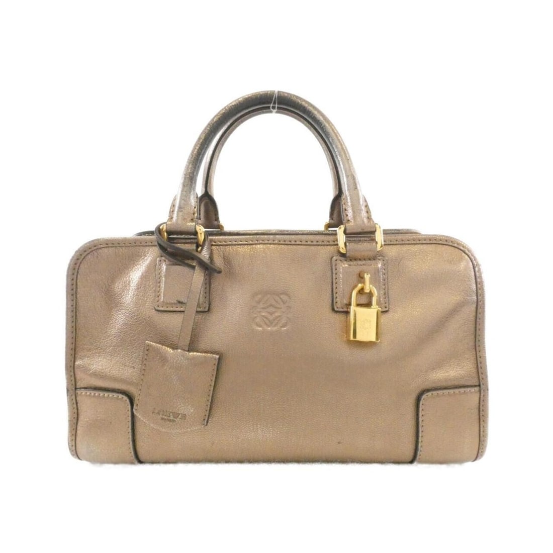Loewe Amazona 28cm 352 37 A03 Handbag: --- Catalog ---Category: SizeSize (HxWxD): 15cm x 29cm x 13cm / 5.9'' x 11.41'' x 5.11''Category: DesignType: HandbagColor: BronzeGender: WomenMaterial: Leather Hardware Color: GoldLeather/Fur Type: G